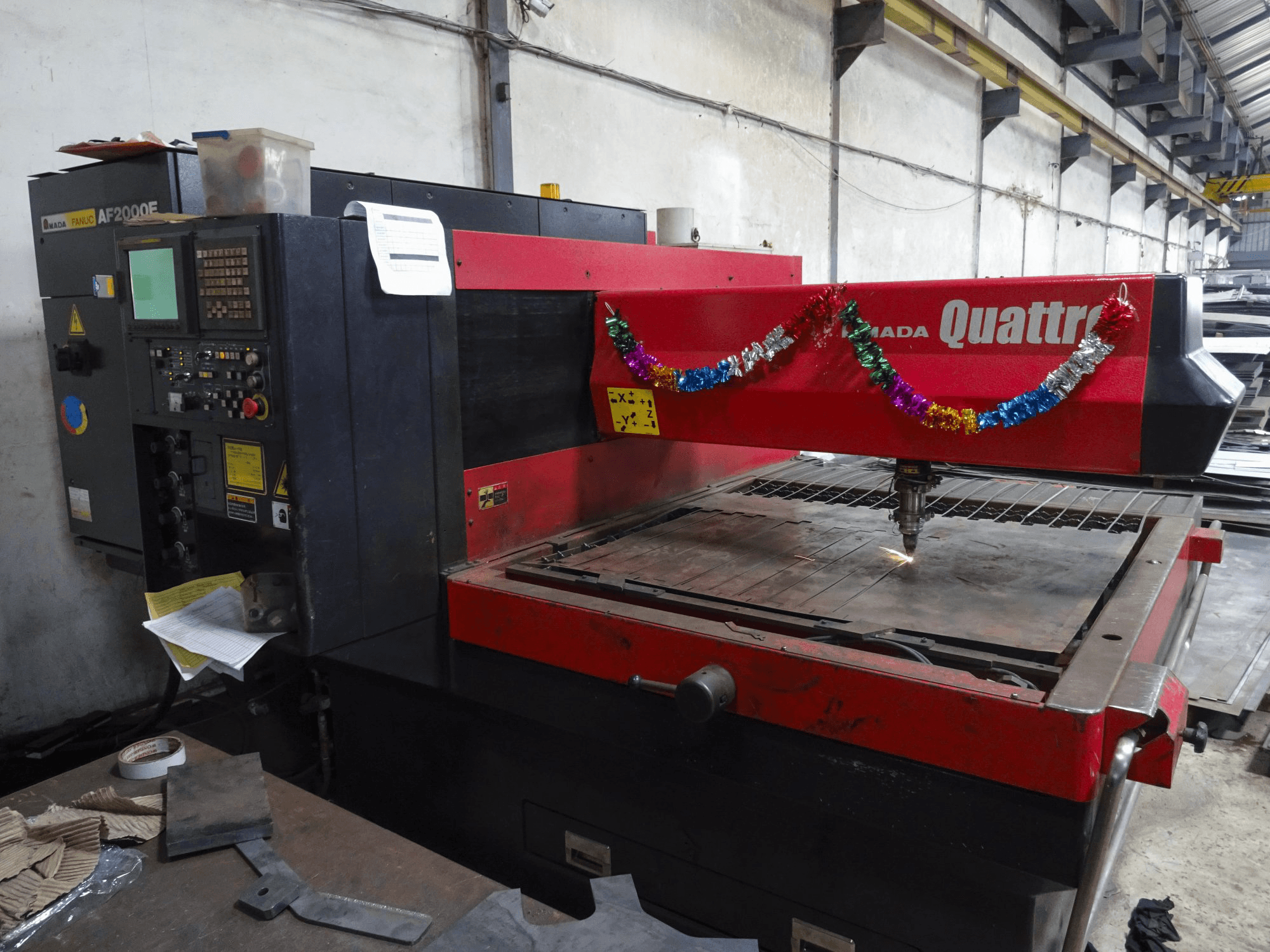 Front view of AMADA Quattro AF2000E machine
