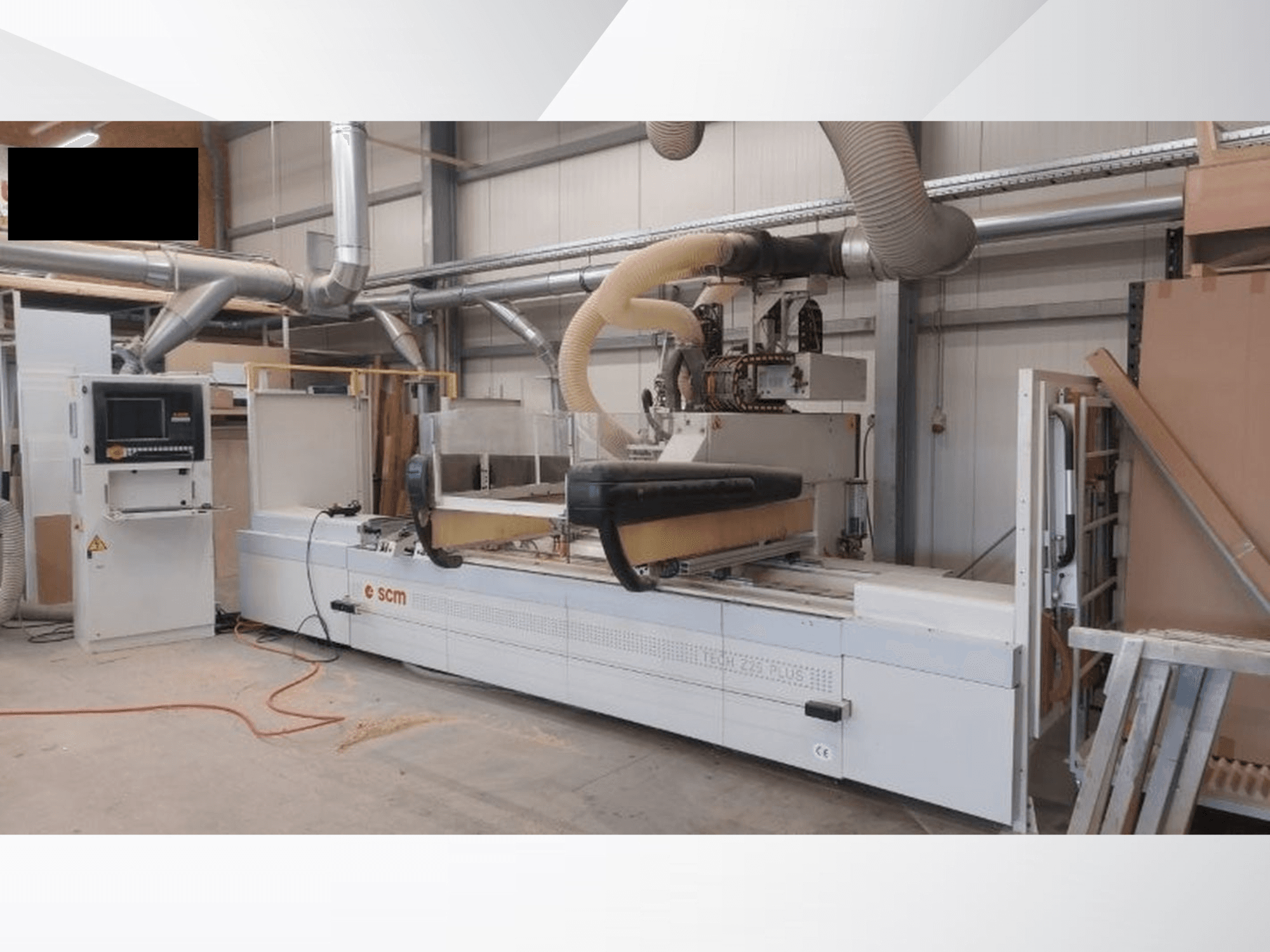 CNC Processing Center SCM TECH Z25 PLUS H-R4 in a workshop, front view showing control panel and dust extraction system.