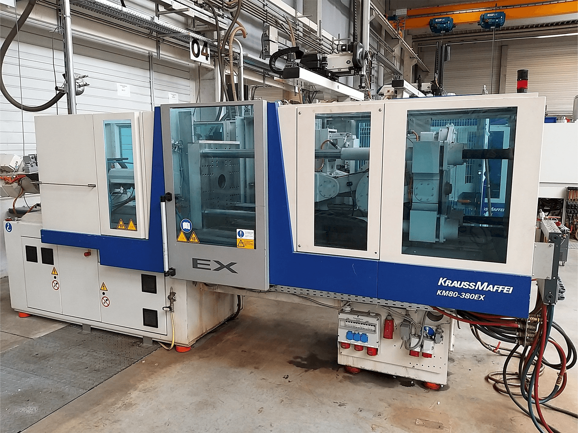 Front view of Krauss Maffei 80-380 Ex machine