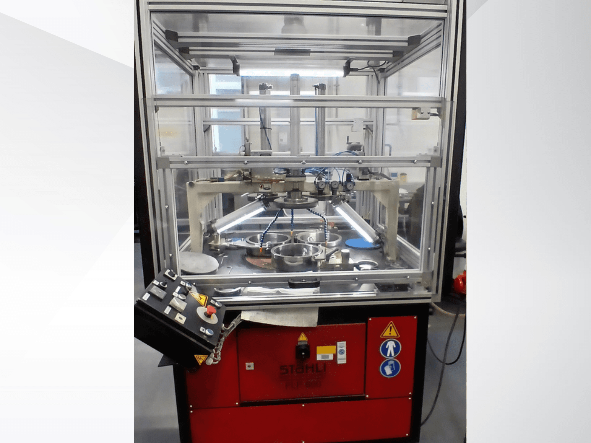 MYLÄP BLP 600/3S machine tool, front view, featuring transparent casing, operational controls, and internal components displayed.