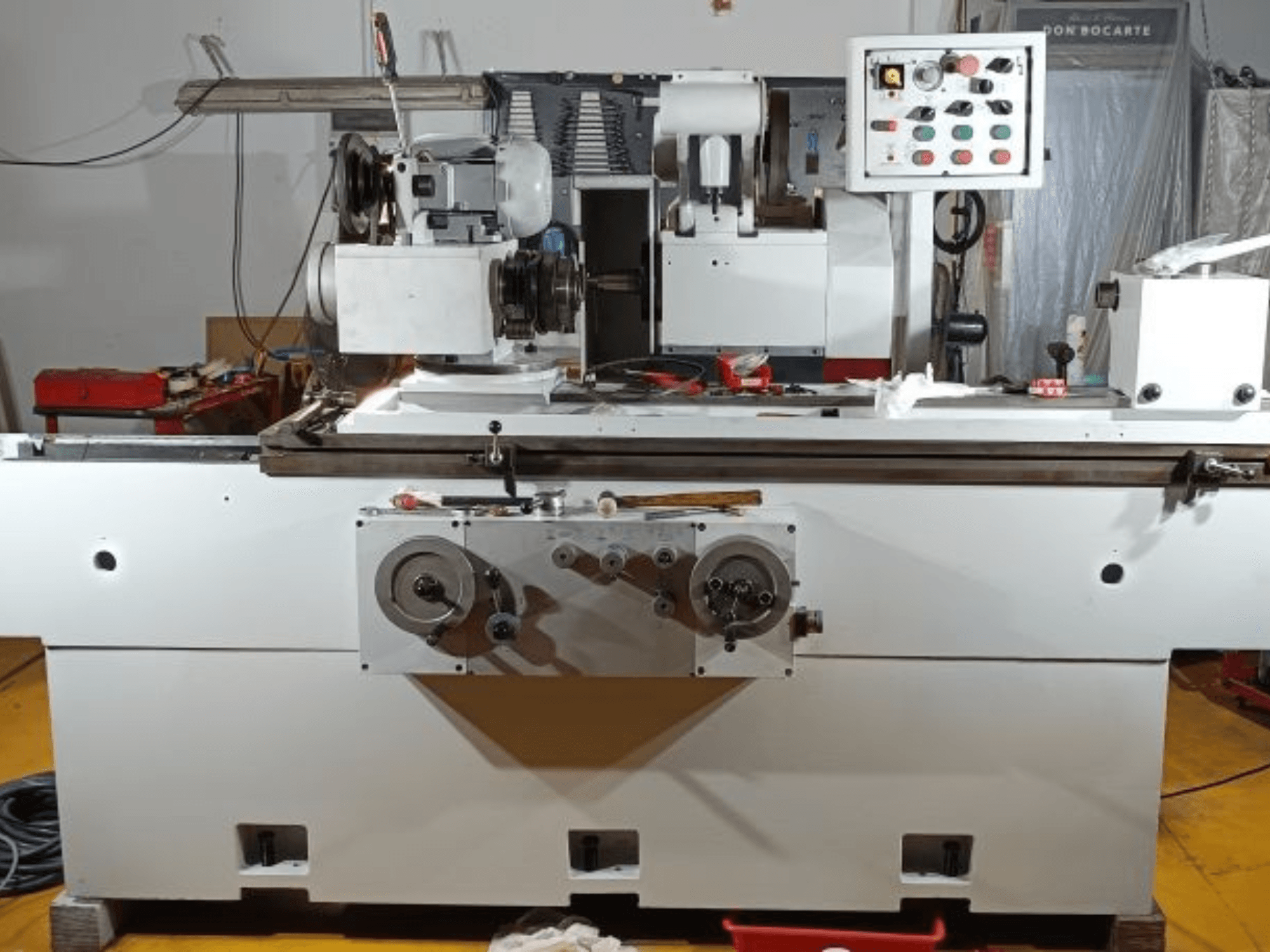 Cylindrical grinding machine GER RHC 1000 in front view, featuring control panel and grinding wheel setup.