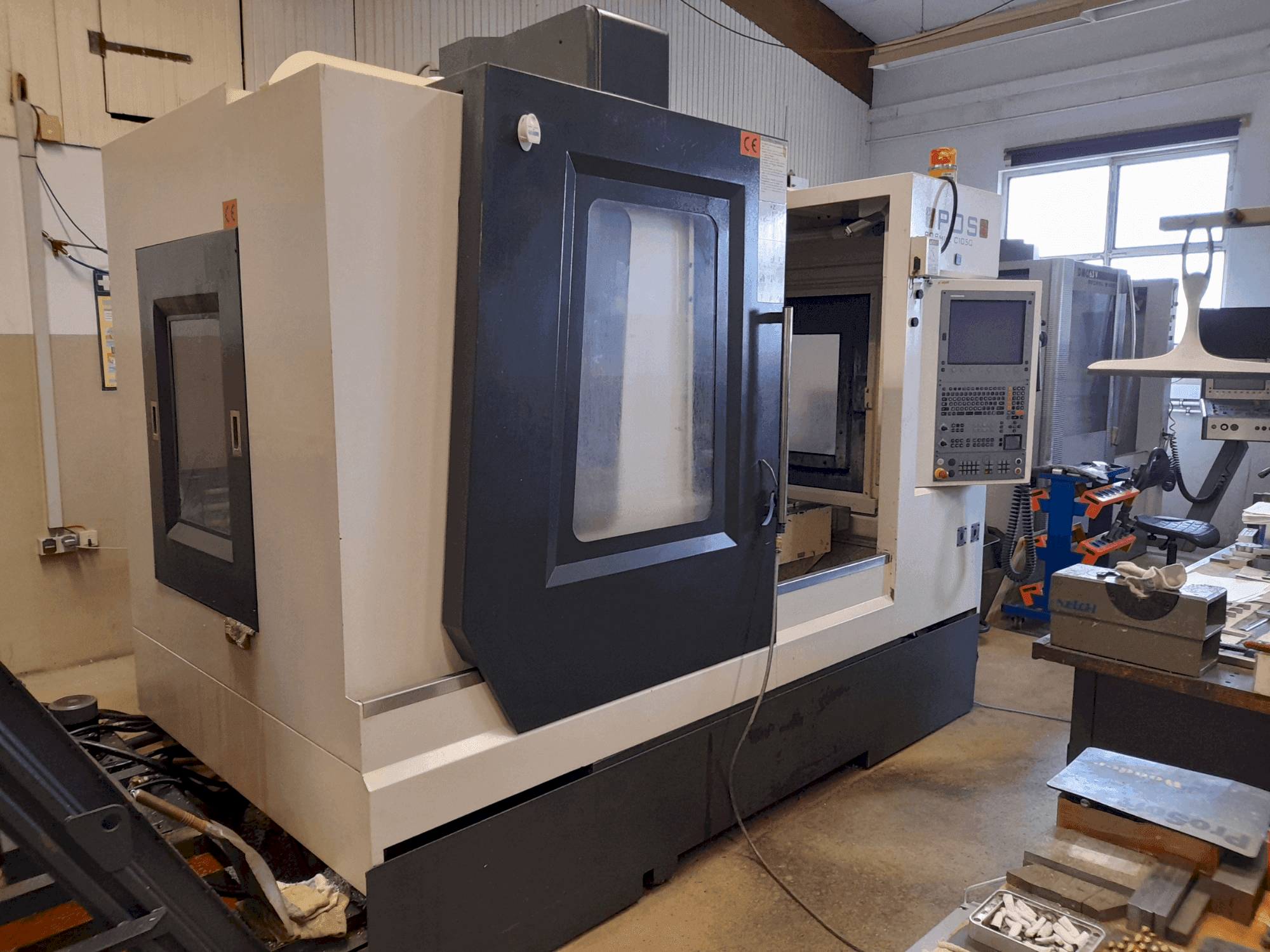 Front view of POSmill C 1050 machine