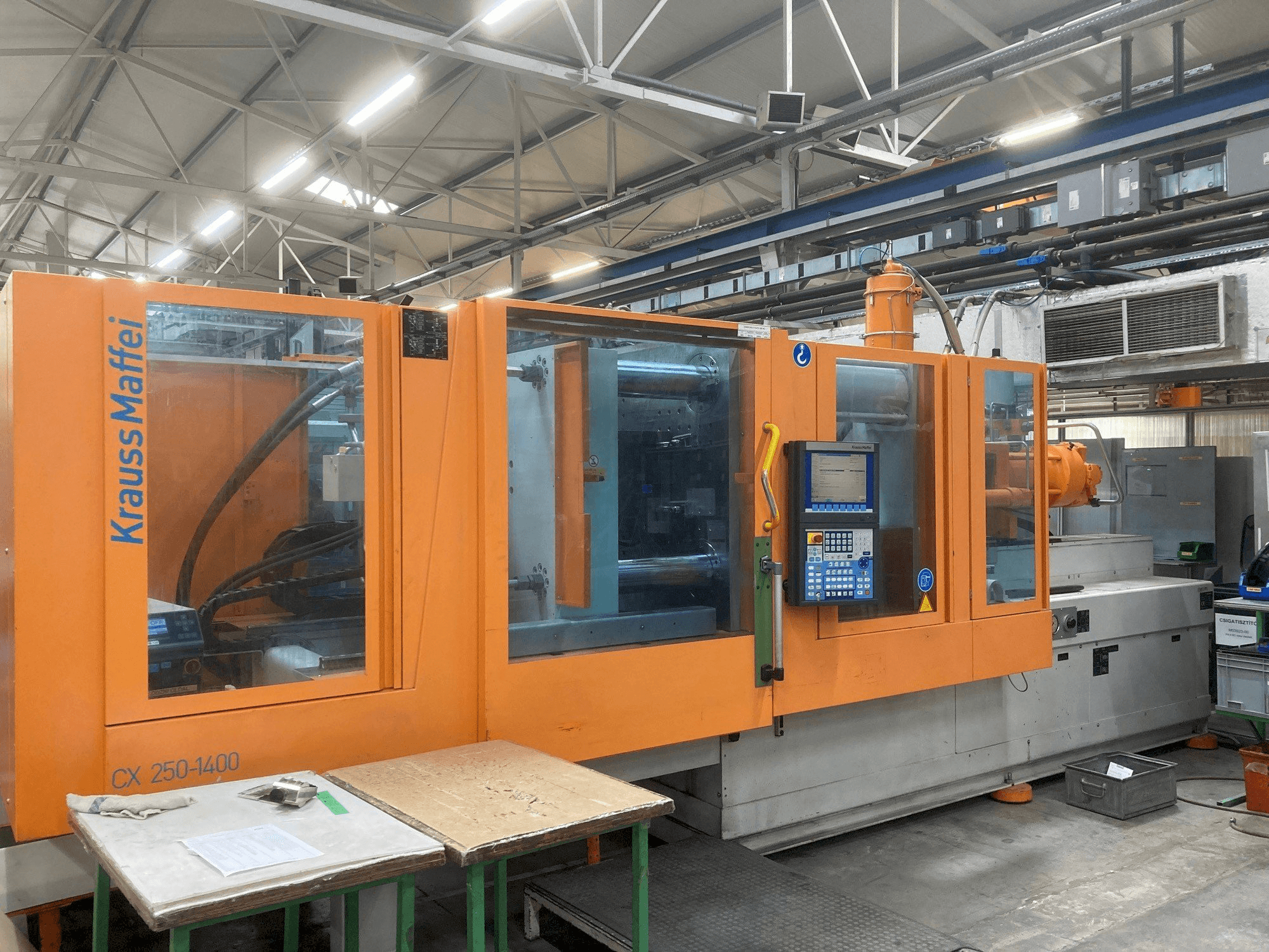 Front view of Krauss Maffei KM 250-400 CX machine