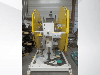 Yellow circular saw blades mounted on a white machine base, front view; model XFT2543, with visible wiring and components.