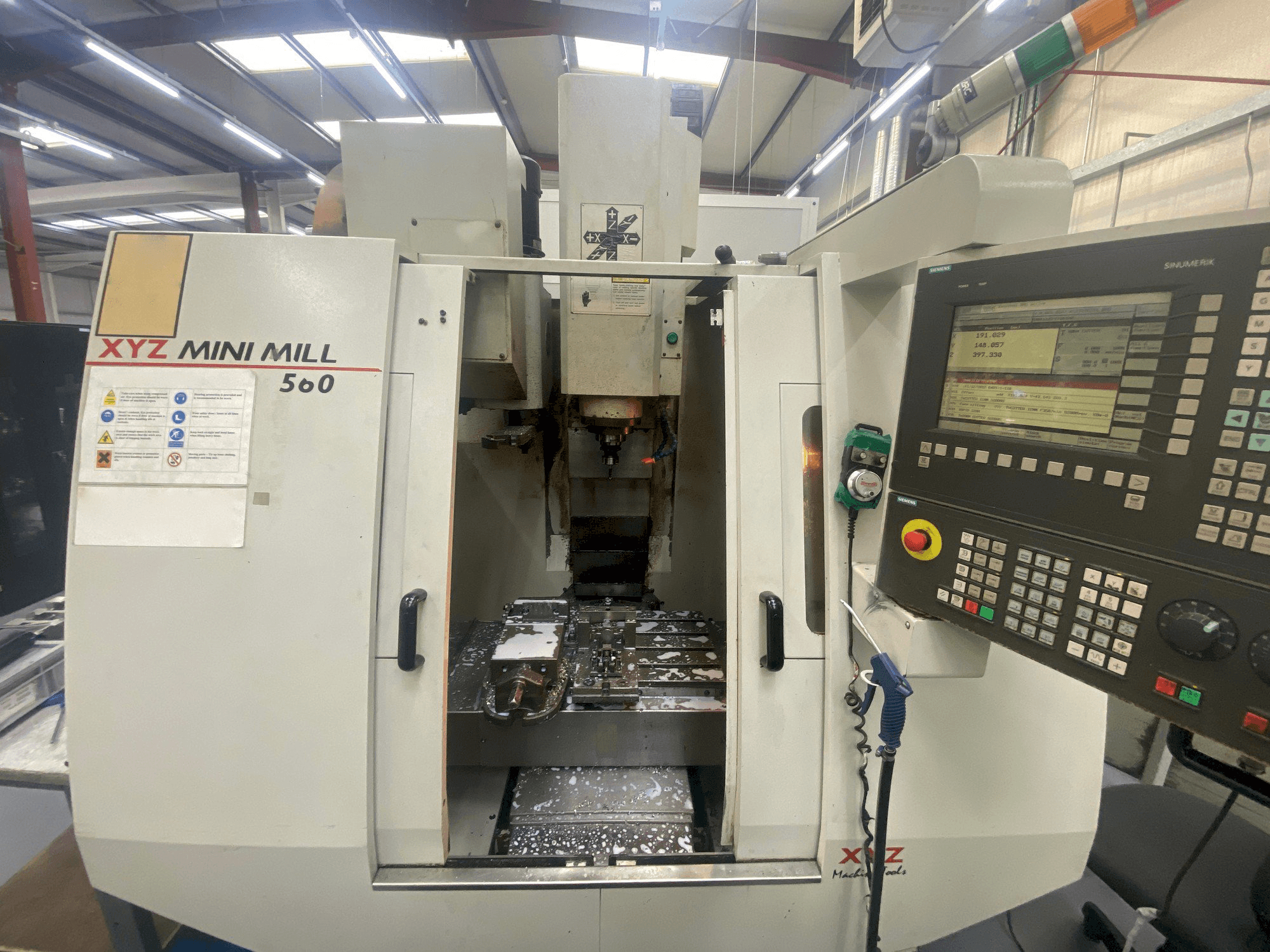 Front view of XYZ Mini Mill 560 machine