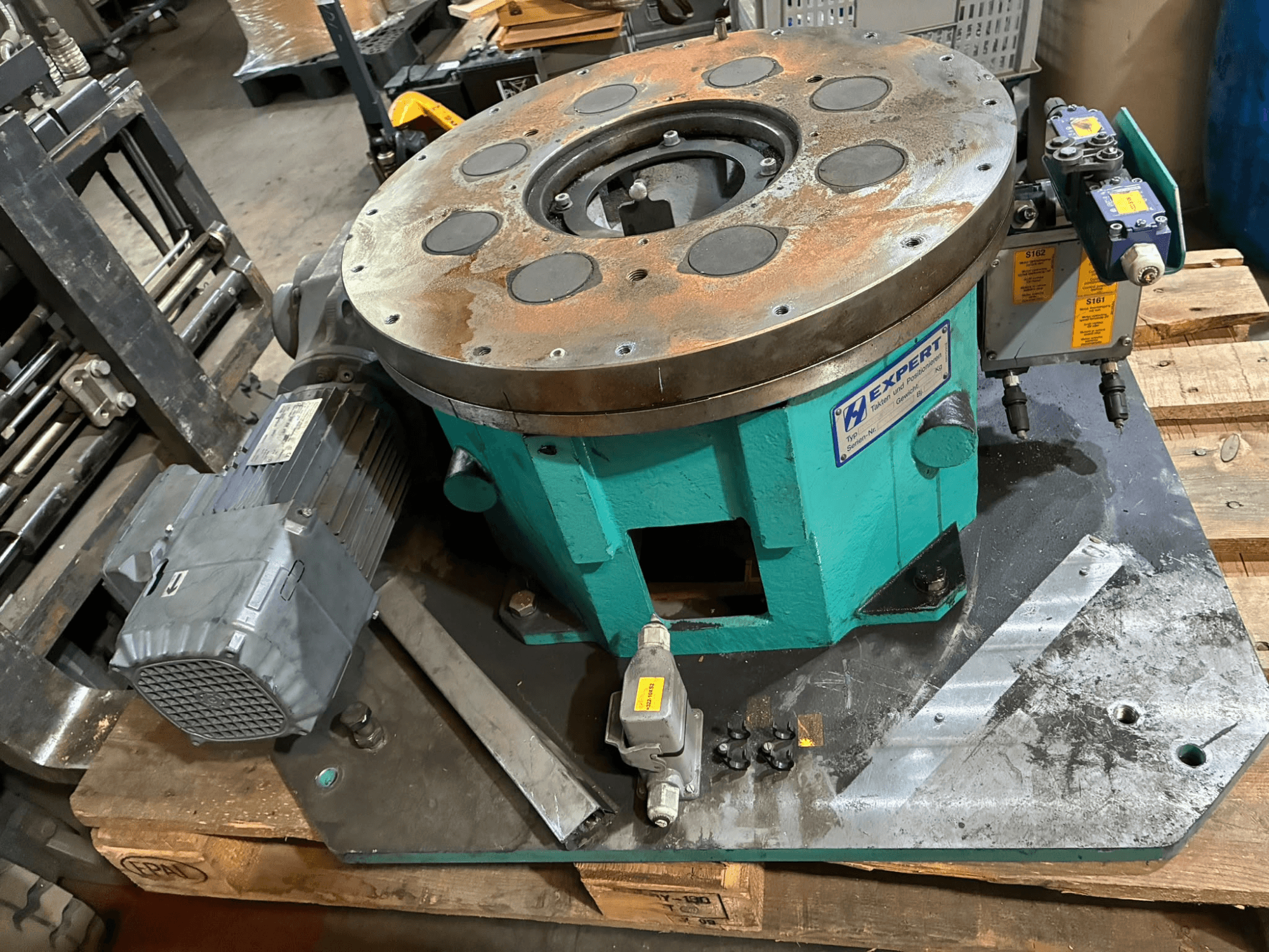 Expert EDX810/0250/8 Automation Equipment, front view, features a motor, control panel, and a circular plate with multiple holes.
