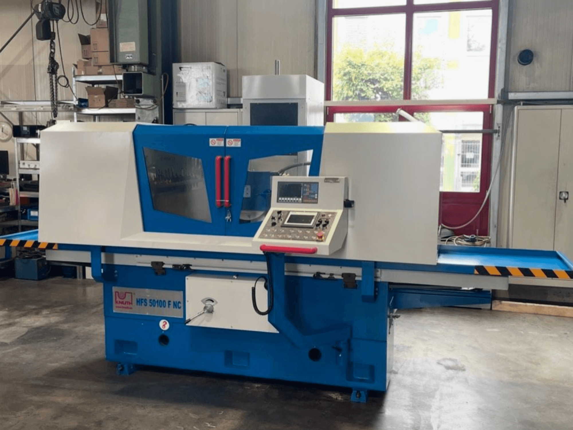 KNUTH HFS 50100 F NC surface grinding machine, front view, featuring control panel, grinding table, and safety features.