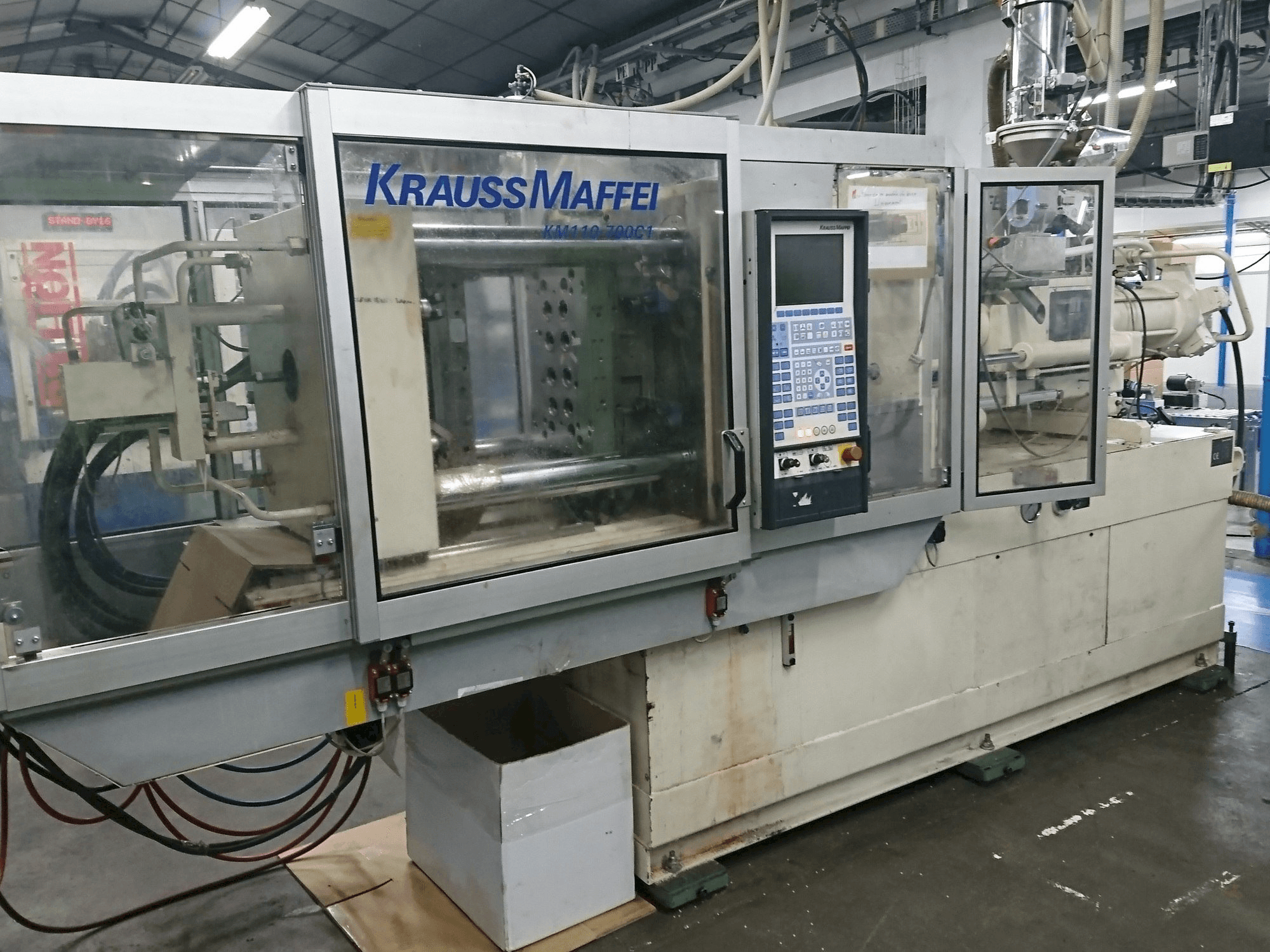Front view of Krauss Maffei 110 - 700 C1 machine