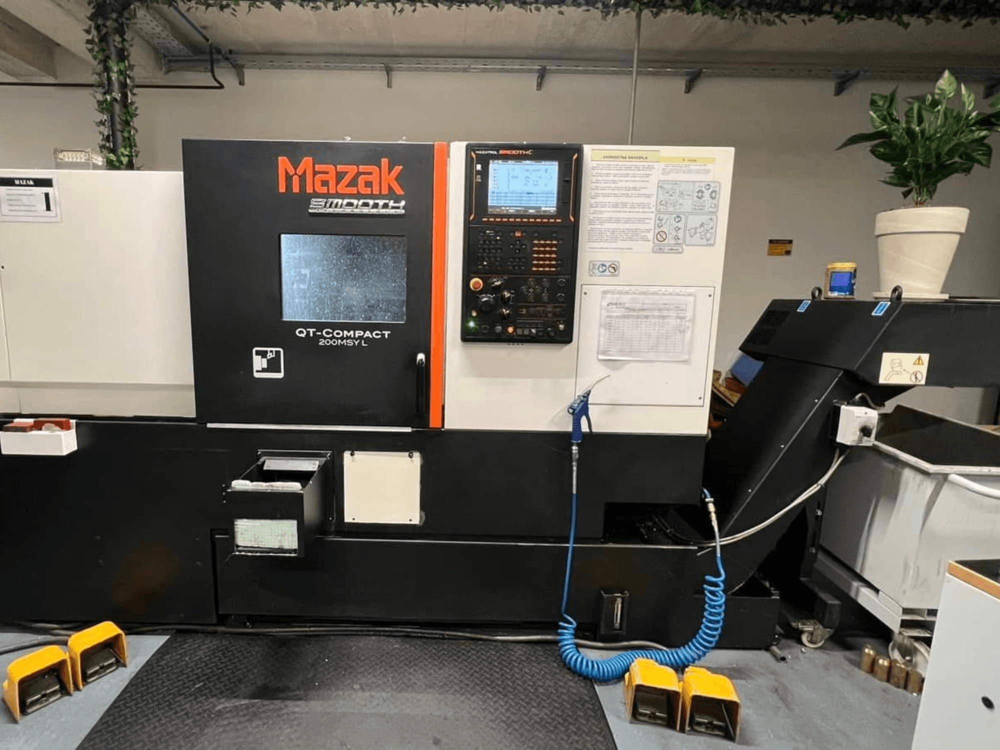 Mazak QUICK TURN COMPACT 200 MSY L horizontal turning machine, front view, featuring control panel and tool storage.