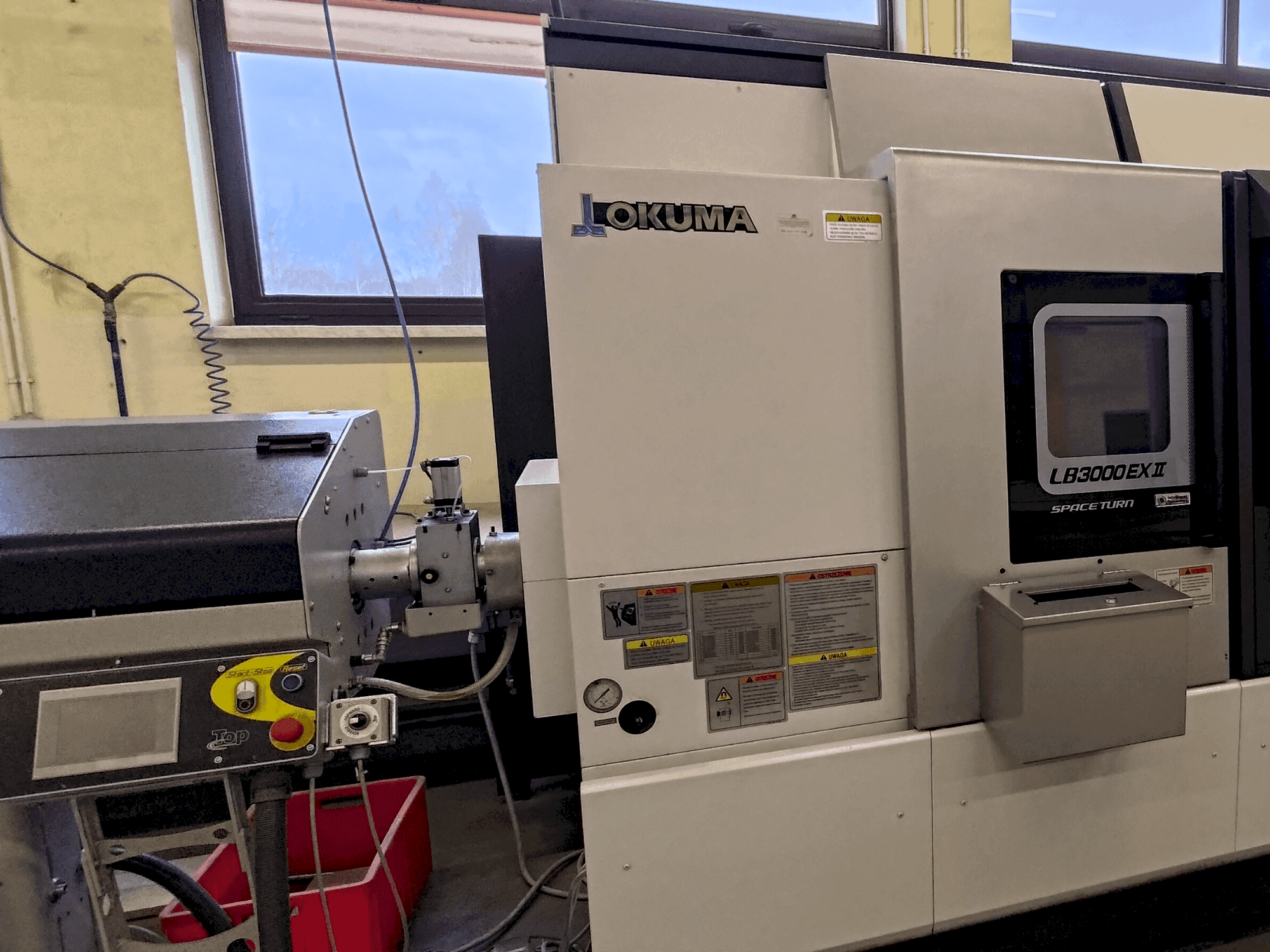 Front view of Okuma LB 3000 EXII MYW 450 machine
