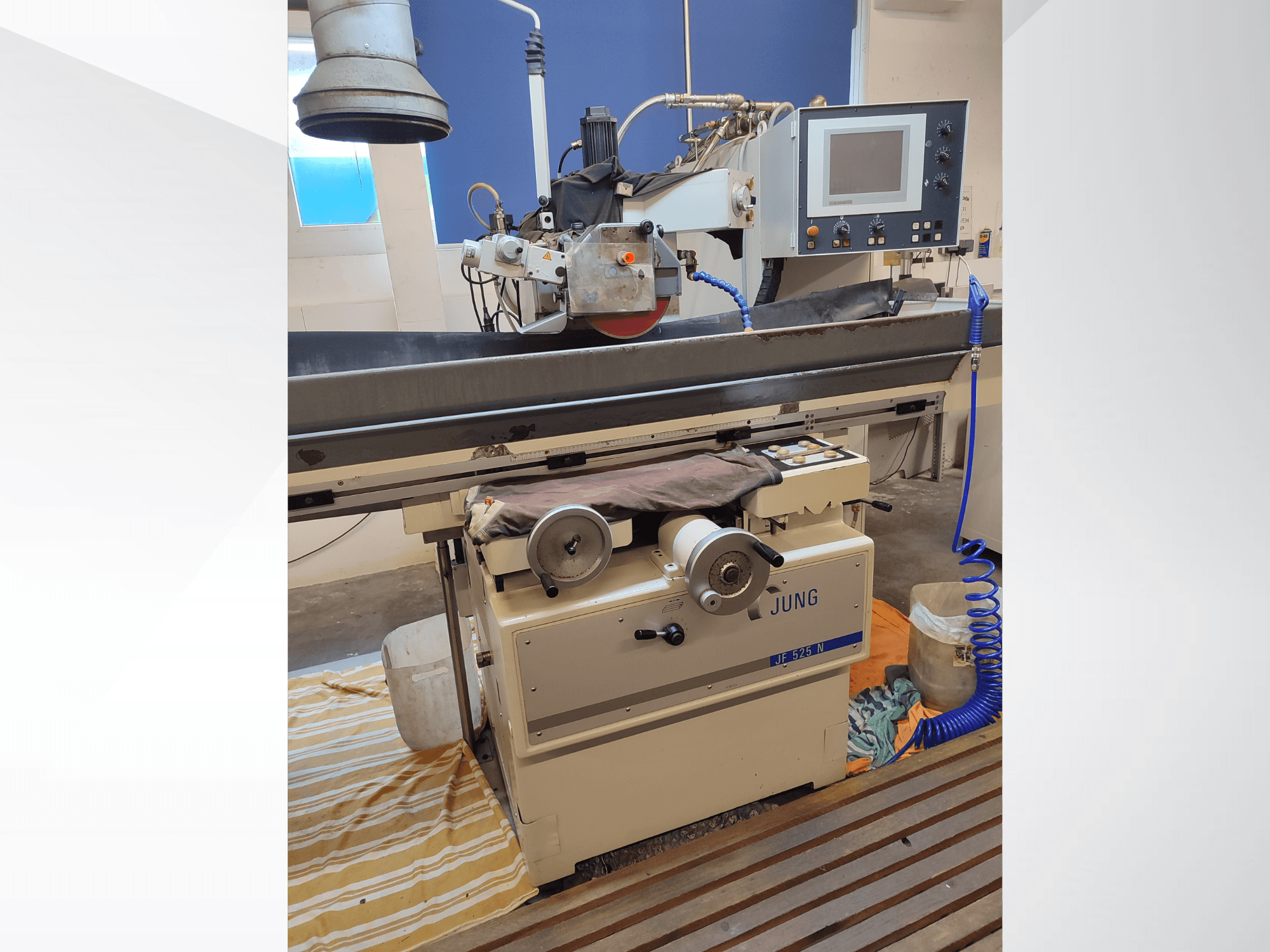 Surface grinding machine JUNG JF 525 N, front view showing grinding wheel, control panel, and base details.
