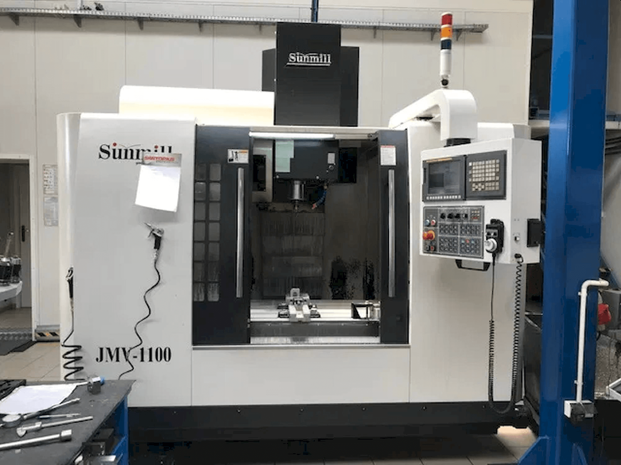 Front view of SUNMILL JMV-1100 machine