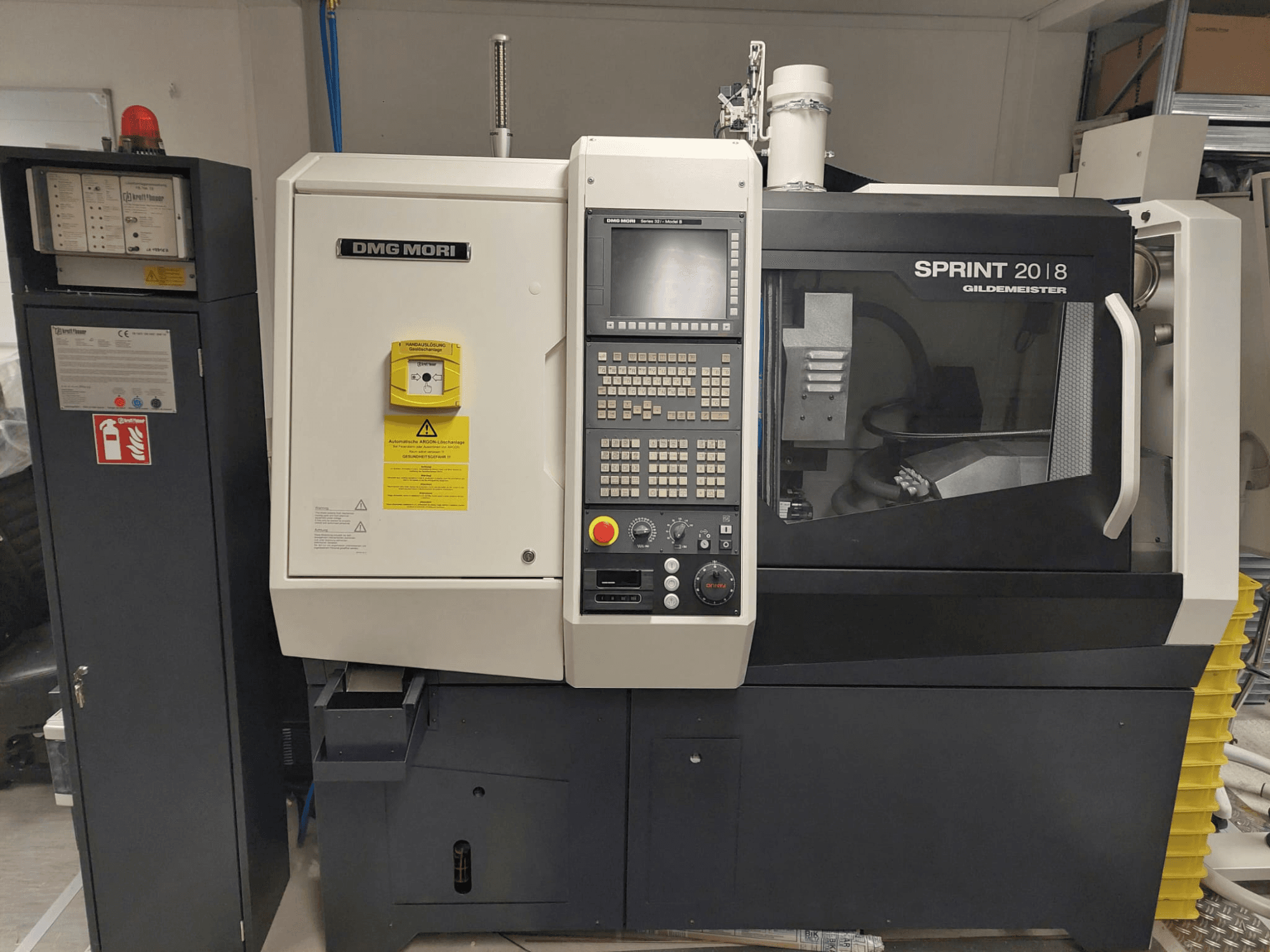 DMG MORI Gildemeister Sprint 20/8 Swiss type turning machine, front view, showcasing control panel and machine components.