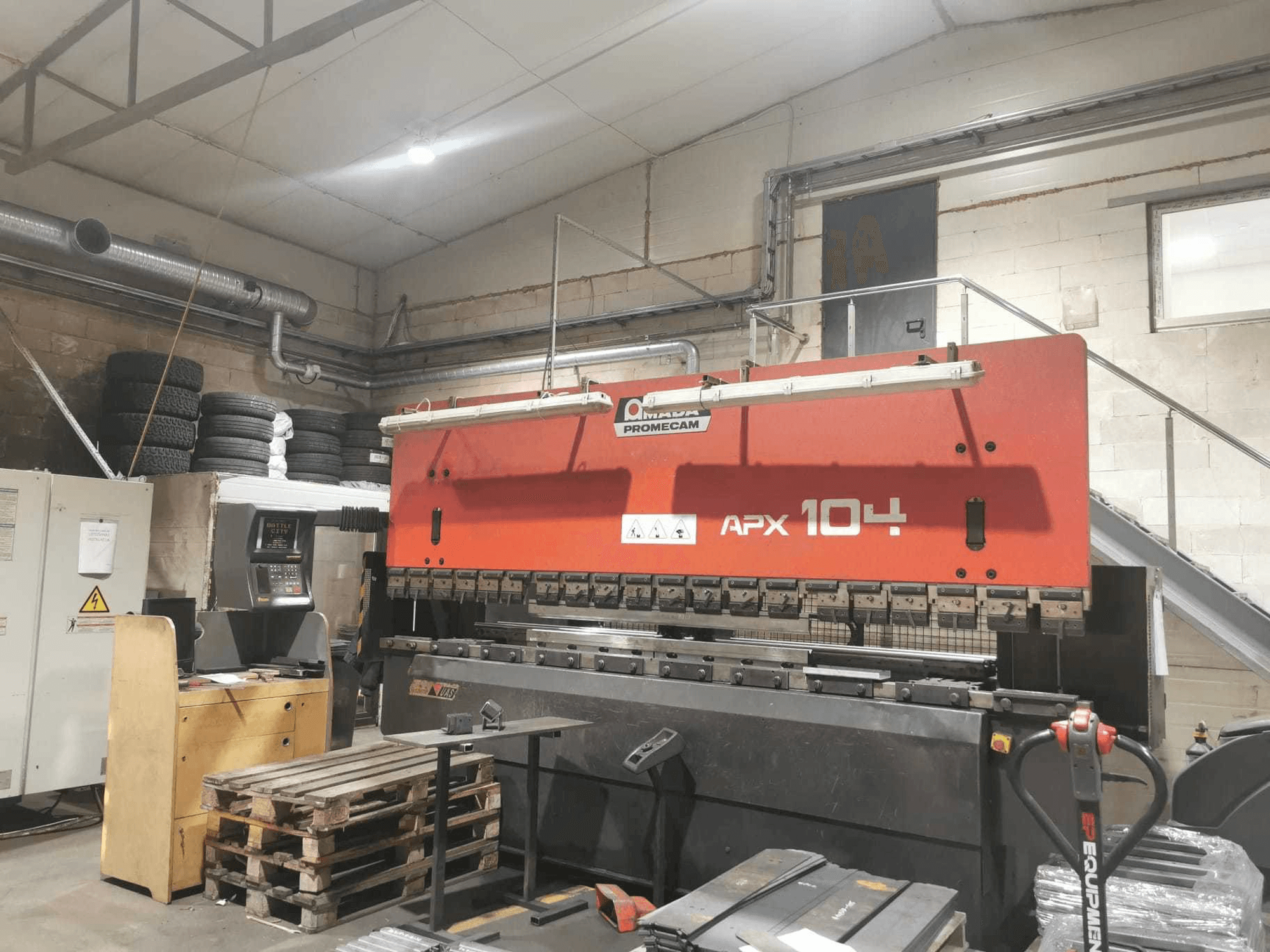 Front view of AMADA APX machine