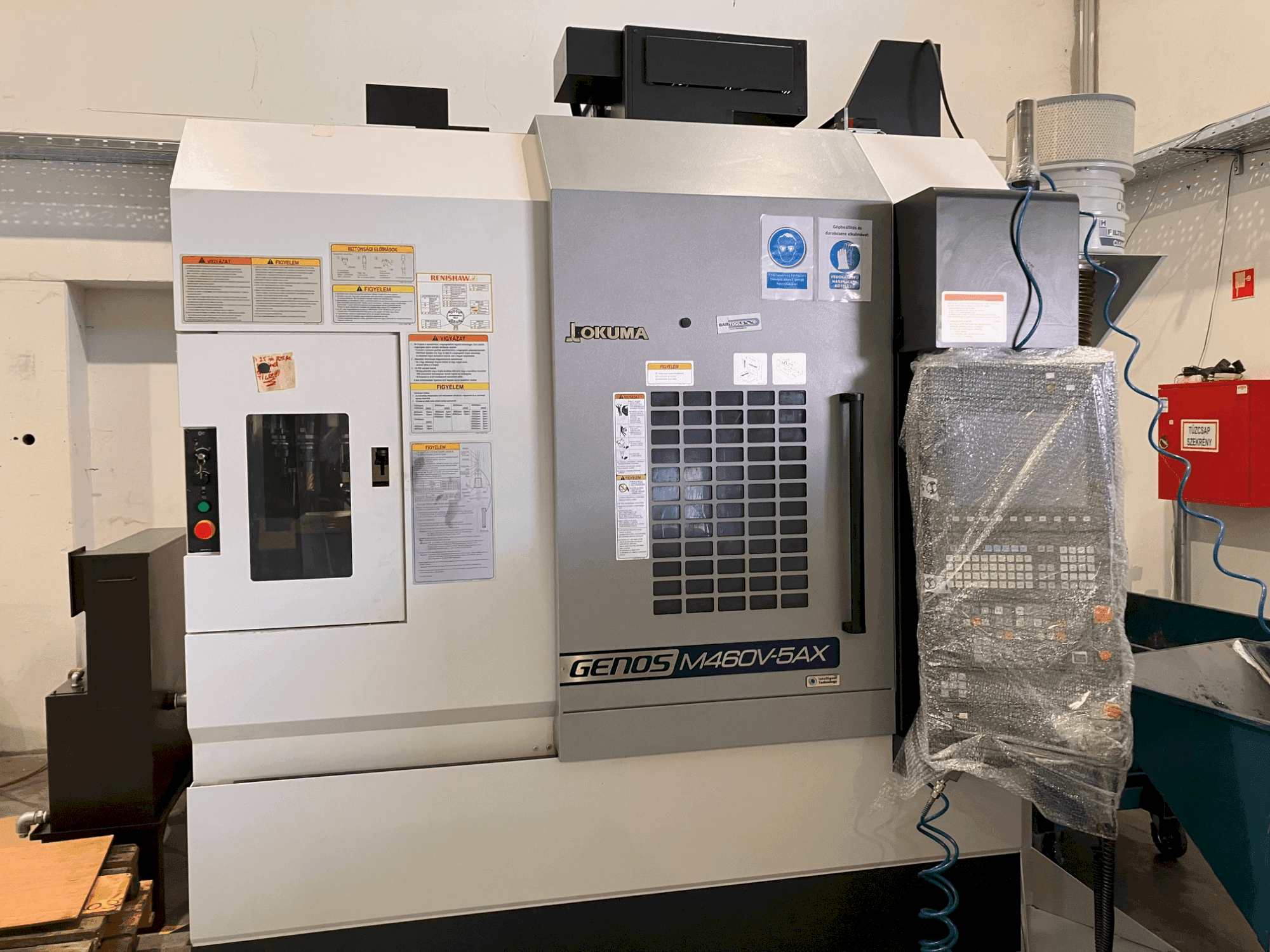 Front view of Okuma GENOS M460V-5AX machine