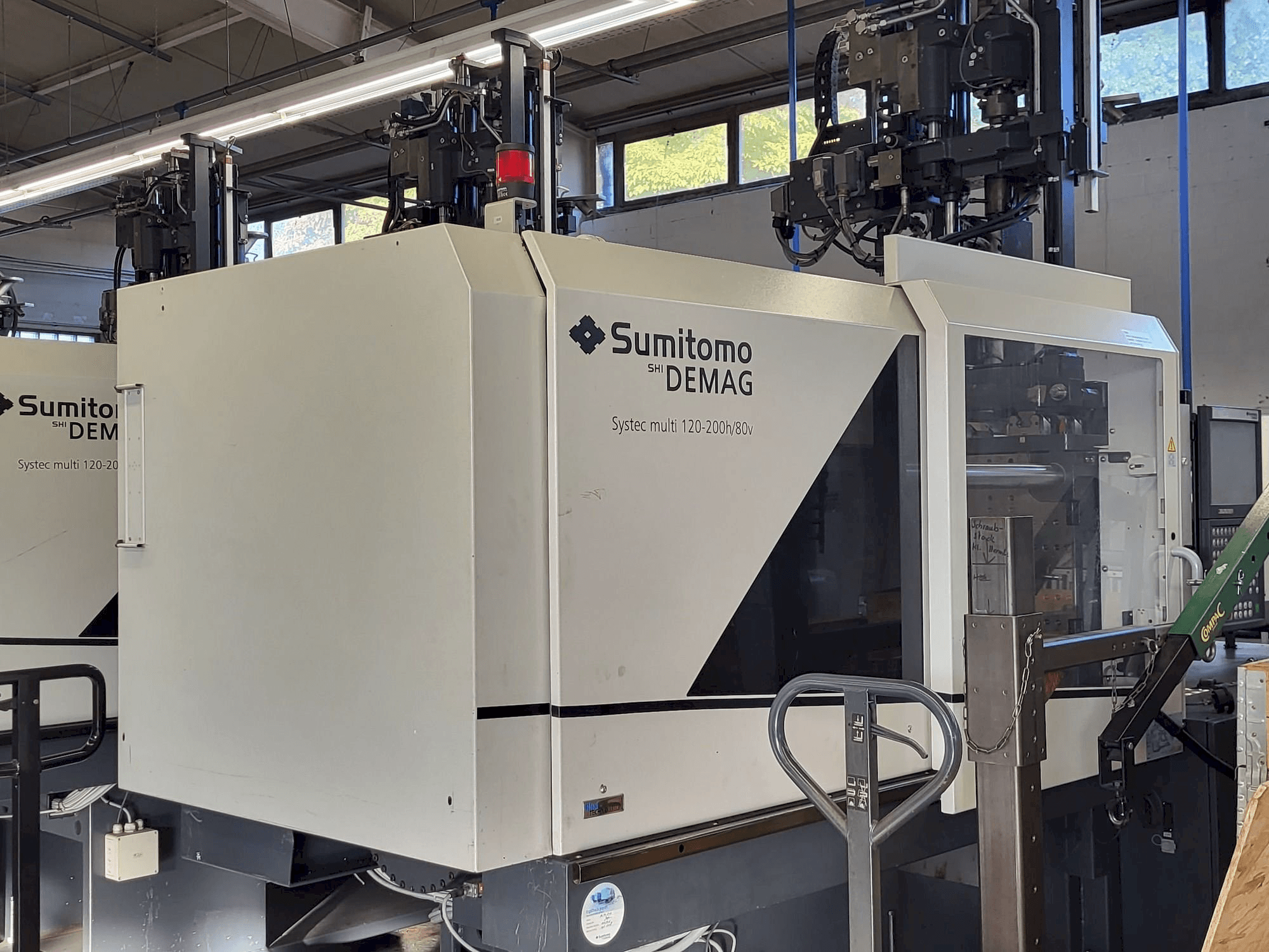 Left side view of Sumitomo SHI DEMAG Multi 120/470-200h/80V machine