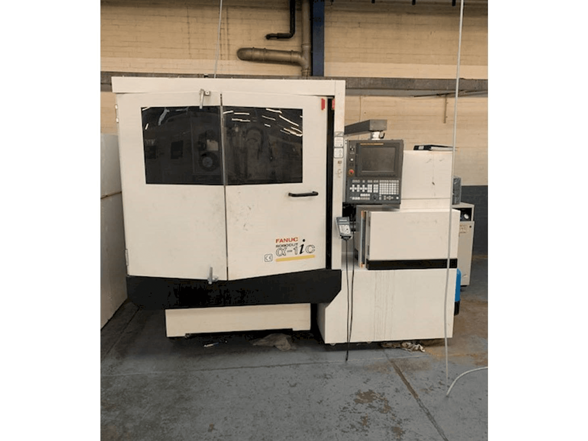 Front view of FANUC ROBOCUT Alpha -1iC S Axis machine