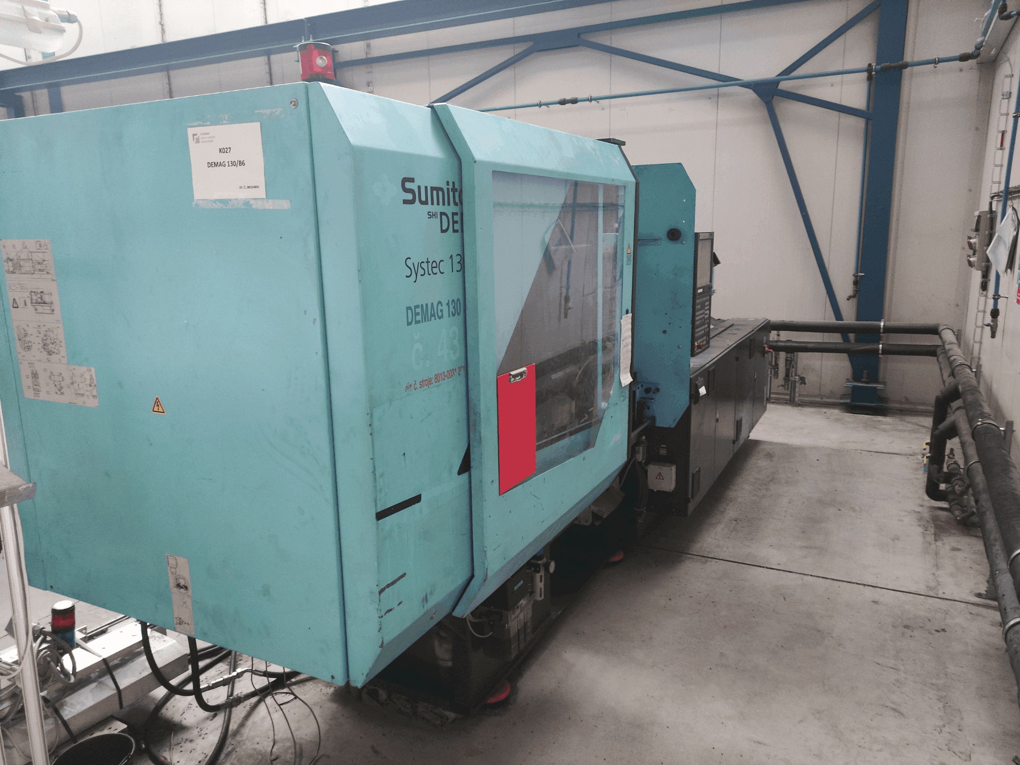 Front view of DEMAG Systec 130/475-430 machine