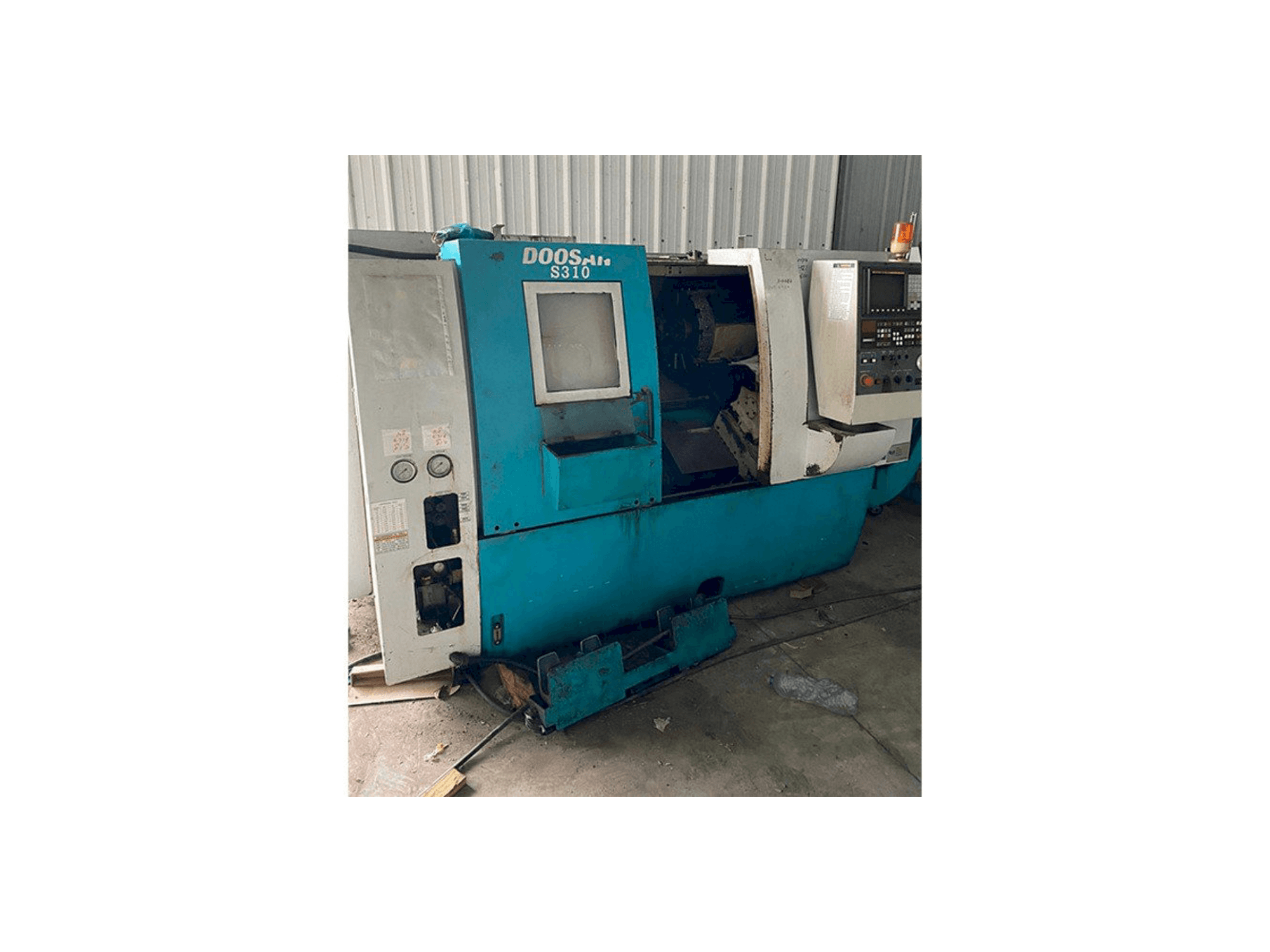 Front view of Doosan S310 machine