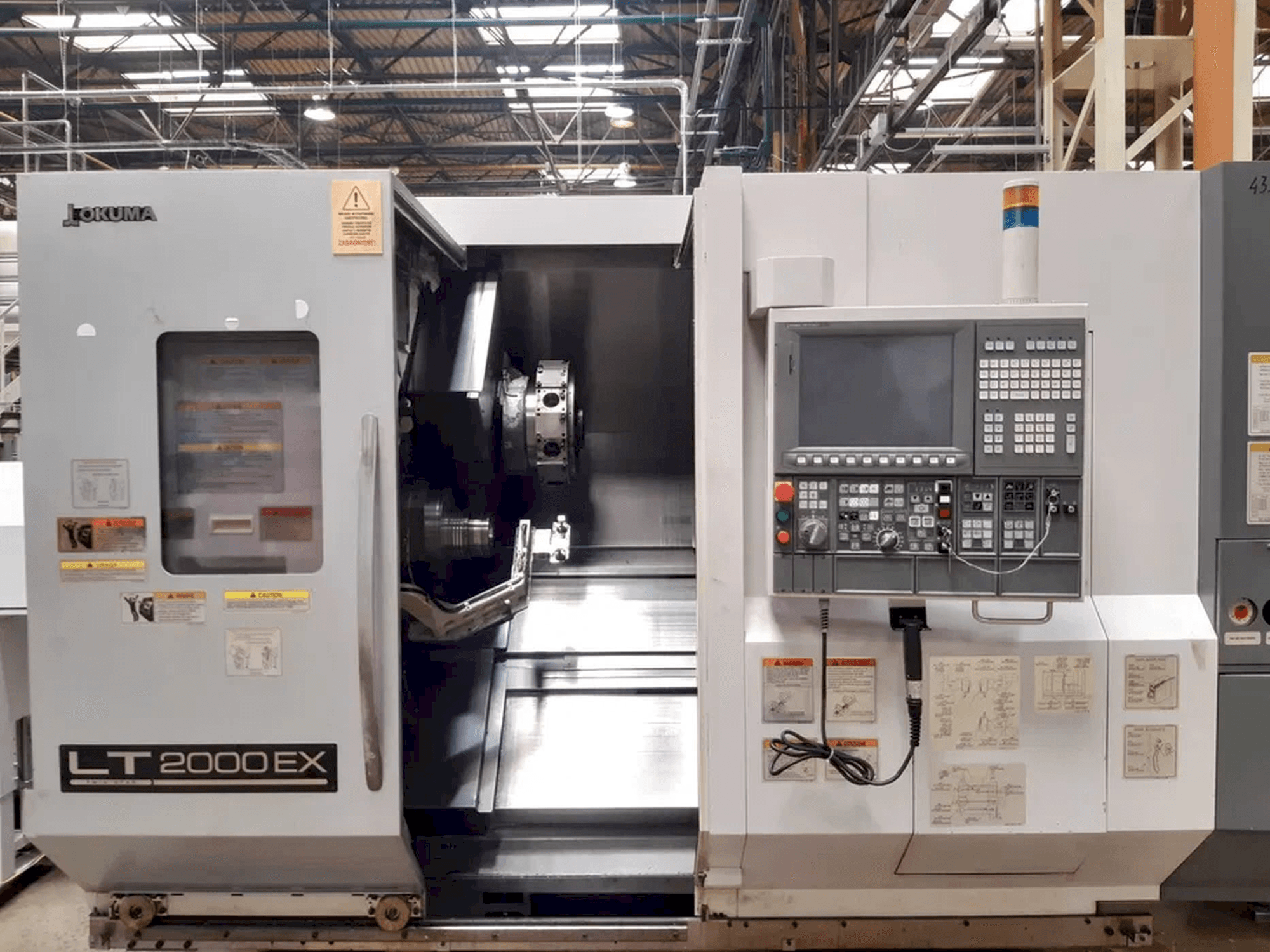 Front view of Okuma LT2000 EX machine