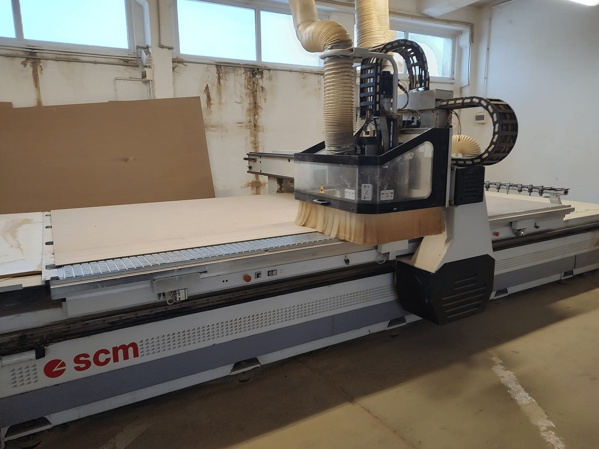 SCM ACCORD 20 CNC Router in front view, showcasing the cutting head and large worktable, ideal for woodworking tasks.