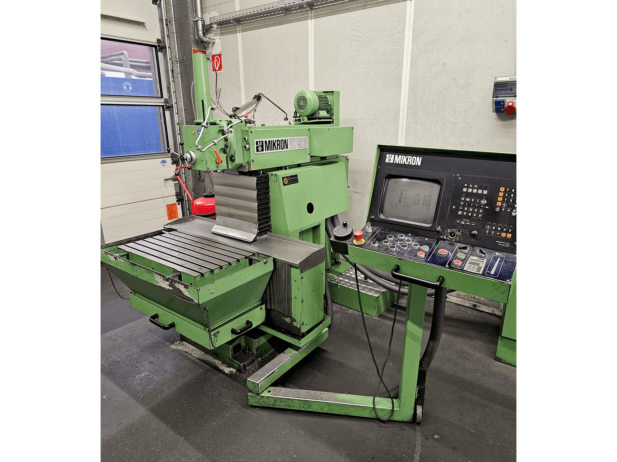 Front view of MIKRON WF-31C machine