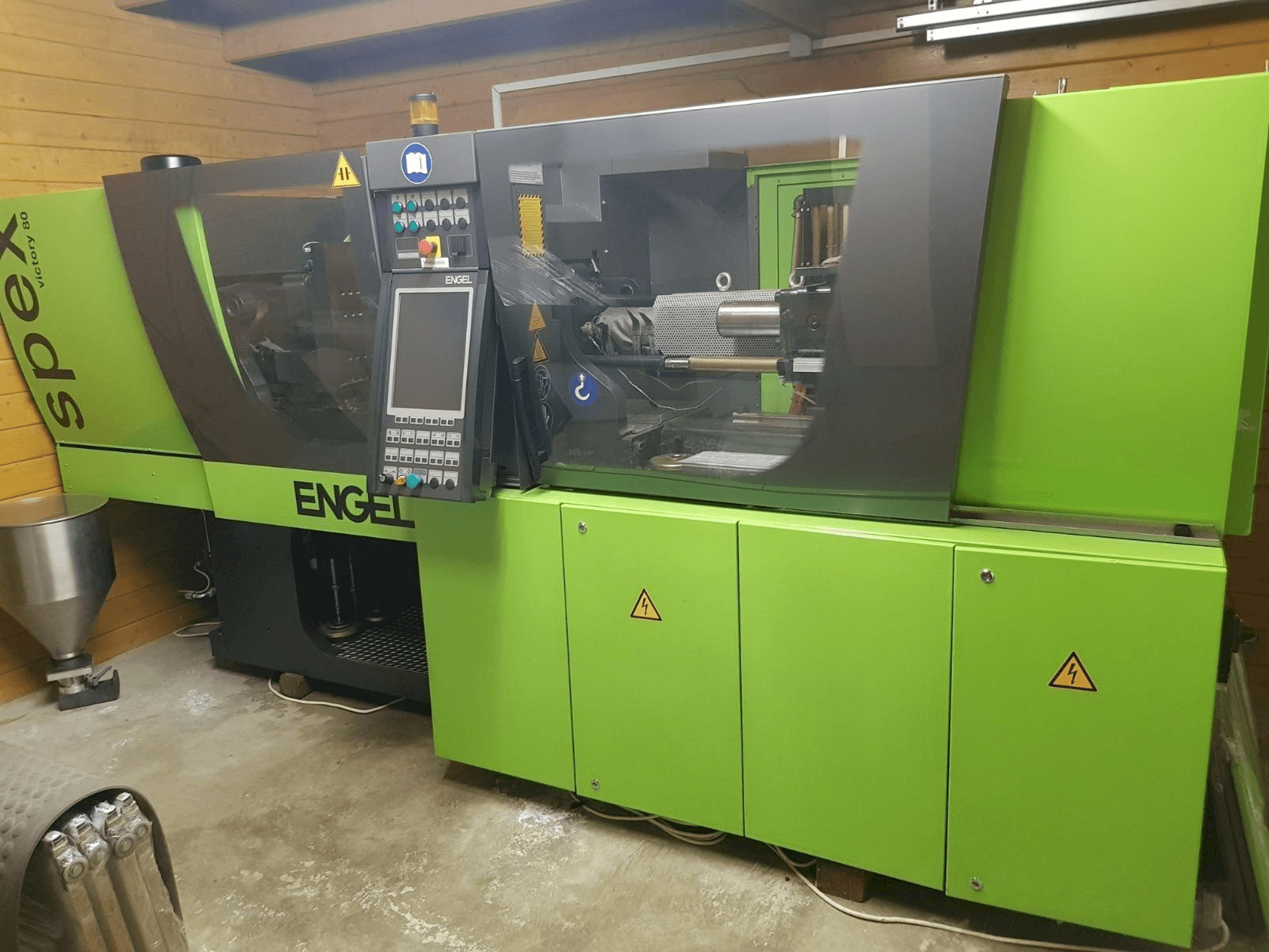 Front view of ENGEL victory 330/80 spex machine