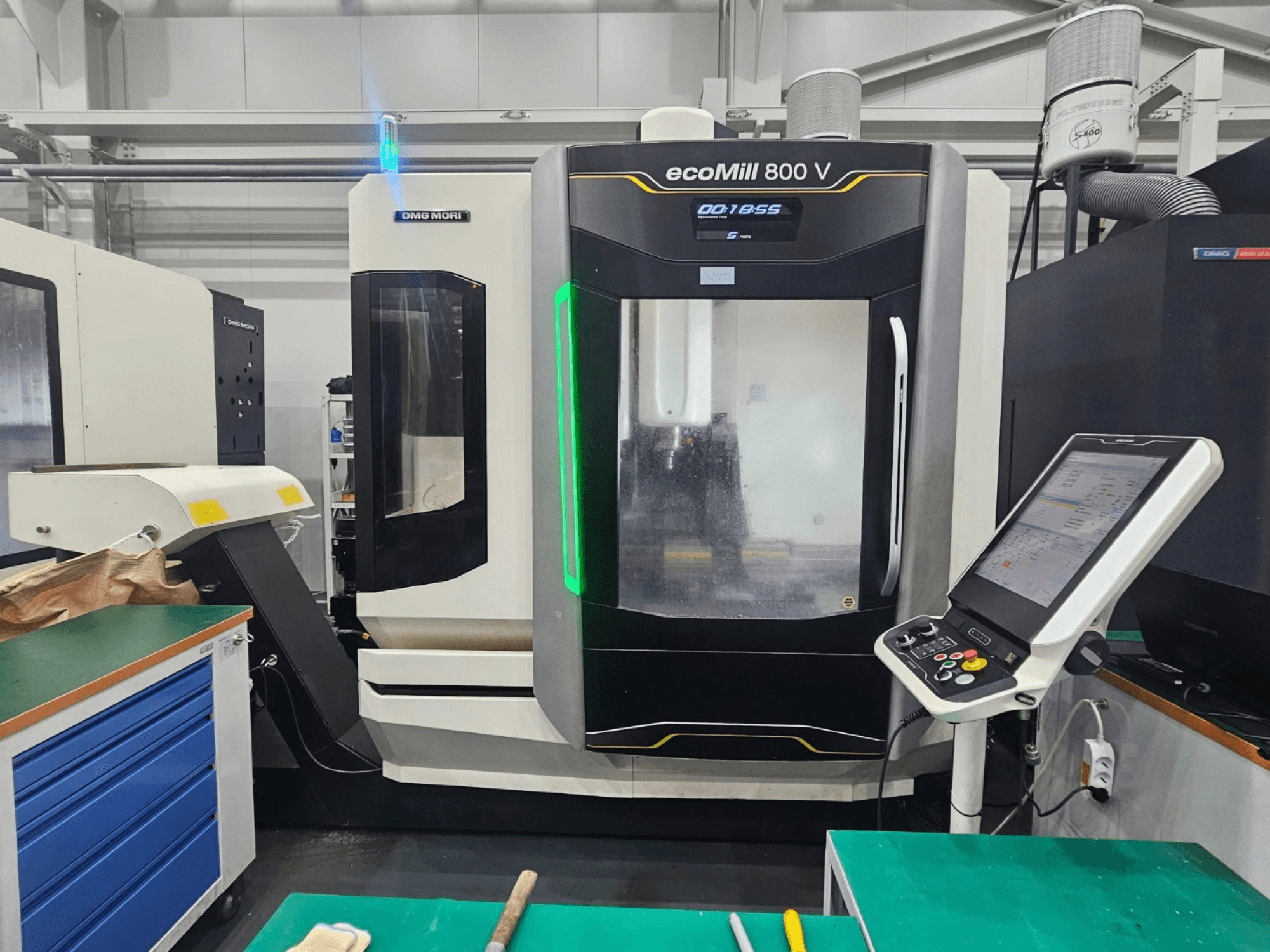 DMG MORI ecoMill 800 V vertical machining centre, front view with control panel and machine details visible.