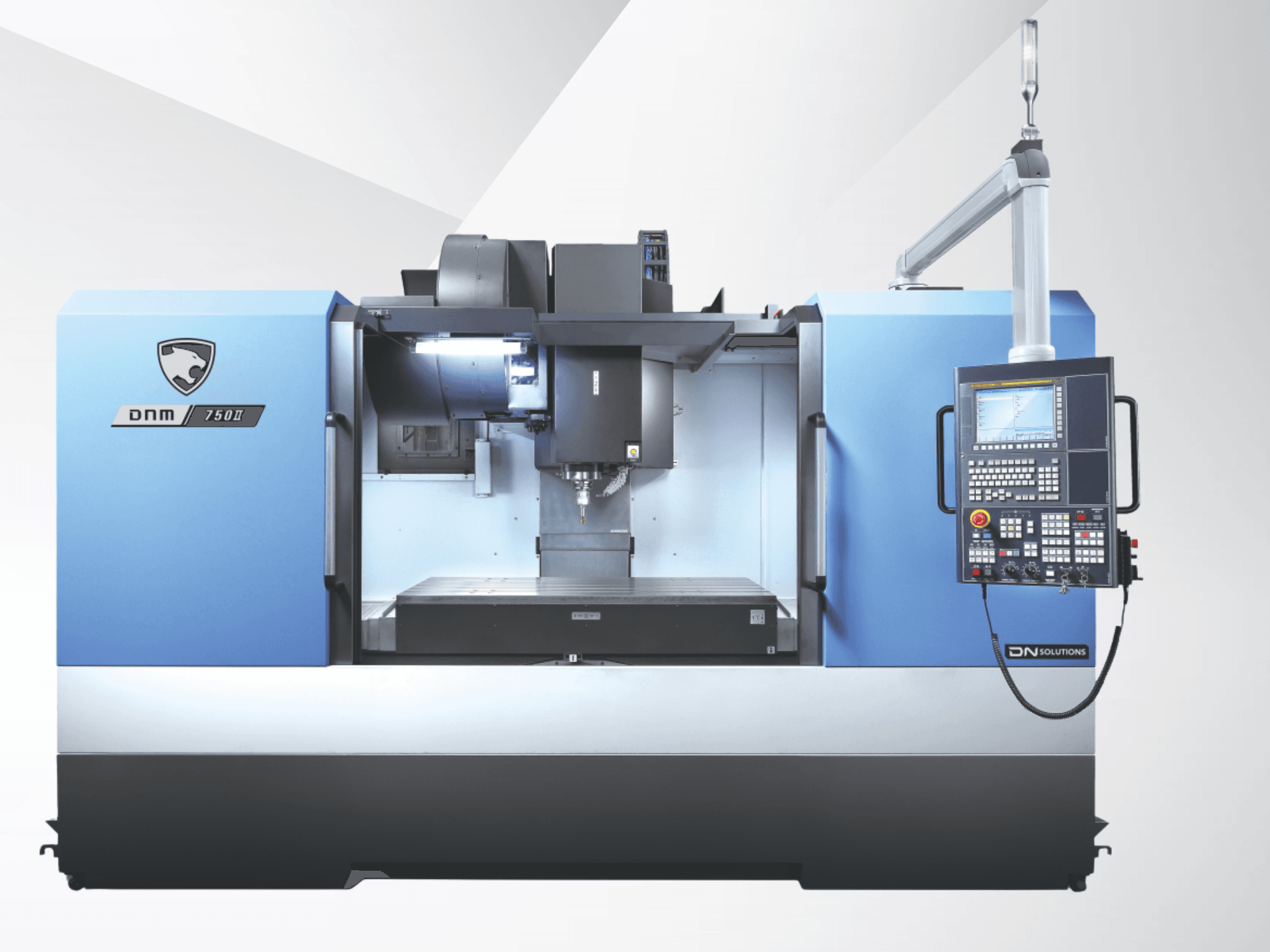 Vertical Machining Centre DN SOLUTIONS DNM 750 II, front view, featuring control panel and open workspace.