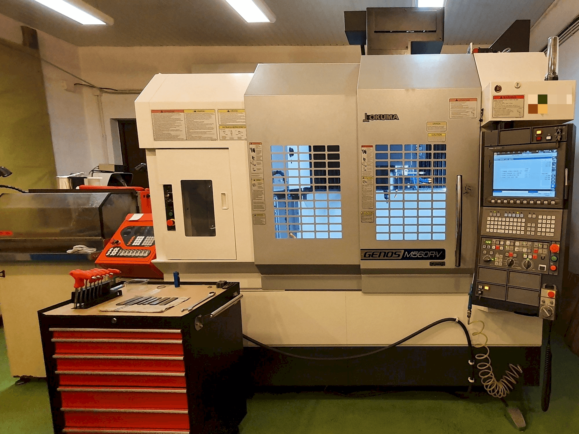 Front view of Okuma GENOS M560R-V machine