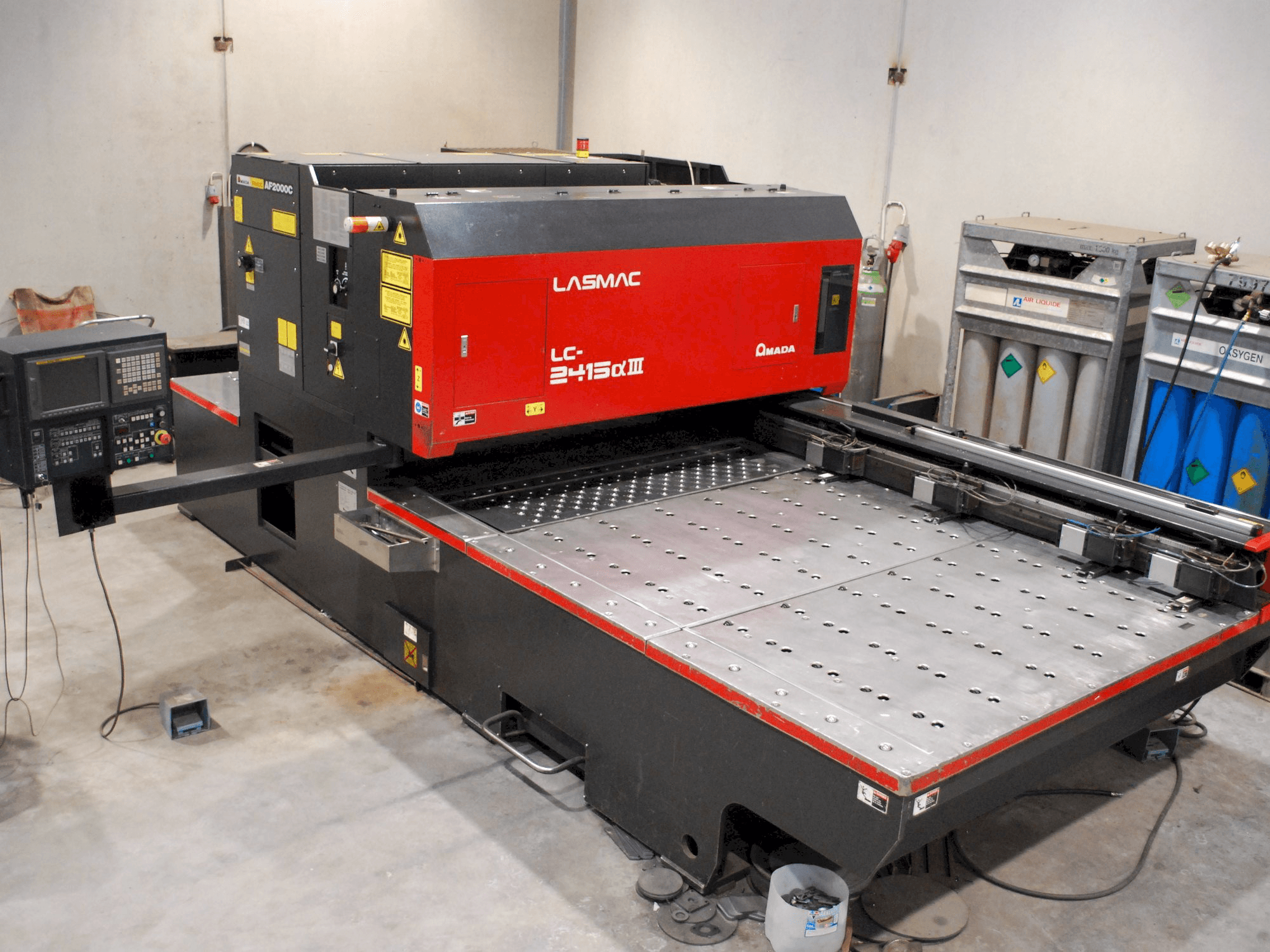 Front view of AMADA LC 2415 Alpha III machine