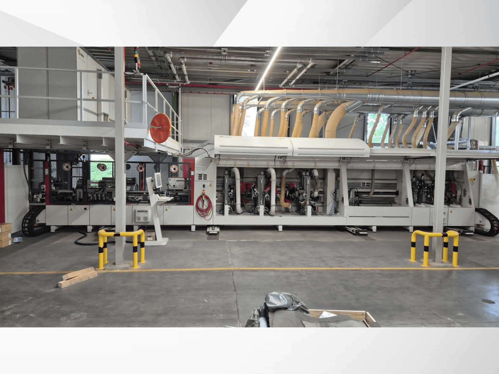 Front view of BURKLE EKMH 1300 laminating press with multiple operational components and safety features visible.
