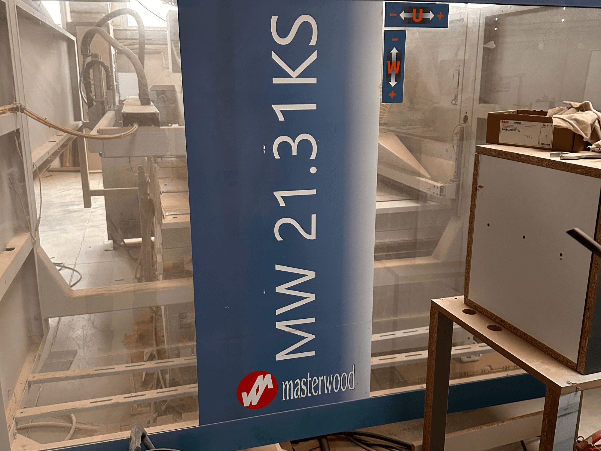 MASTERWOOD Ks 21.31 wood boring machine, front view, showing model details and surrounding workspace.
