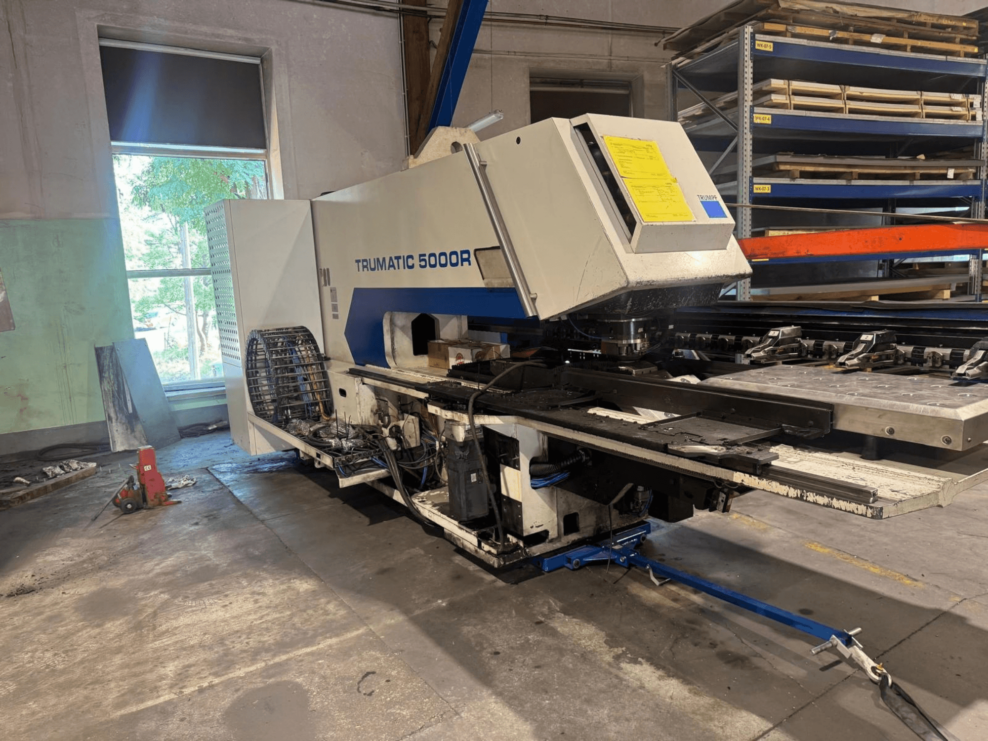 CNC Punching Machine TRUMPF TRUMATIC 5000R in a workshop, front view showcasing its controls and punch area.