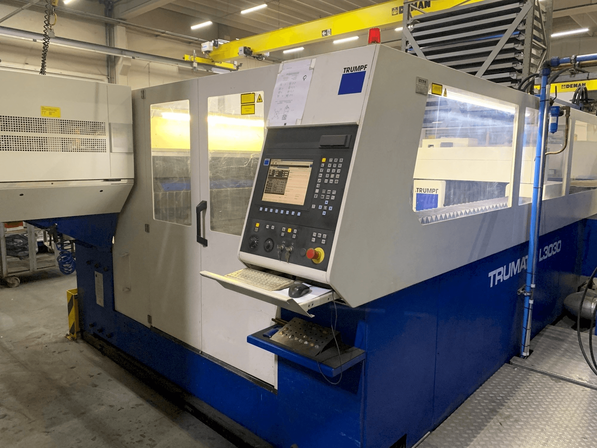Front view of Trumpf Trumatic L3030 4kW + Liftmaster machine