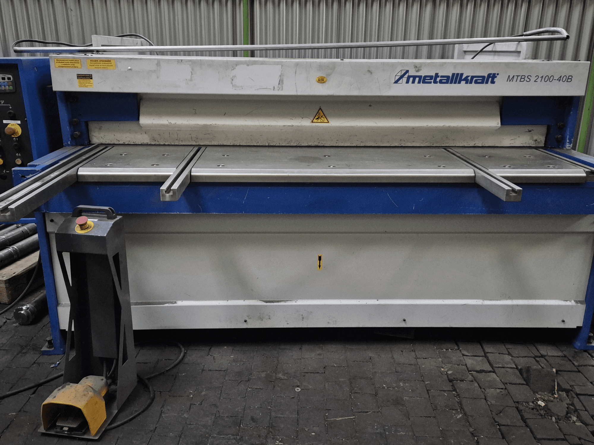 CNC Shearing Machine Metallkraft MTBS 2100-40B, front view showcasing control panel and cutting table with safety features.