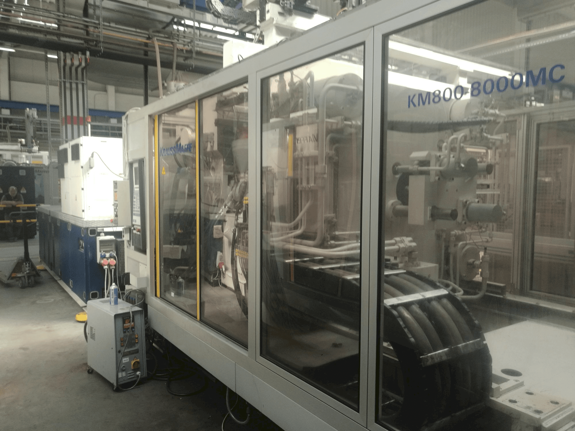 Front view of Krauss Maffei 800-8000 MC machine