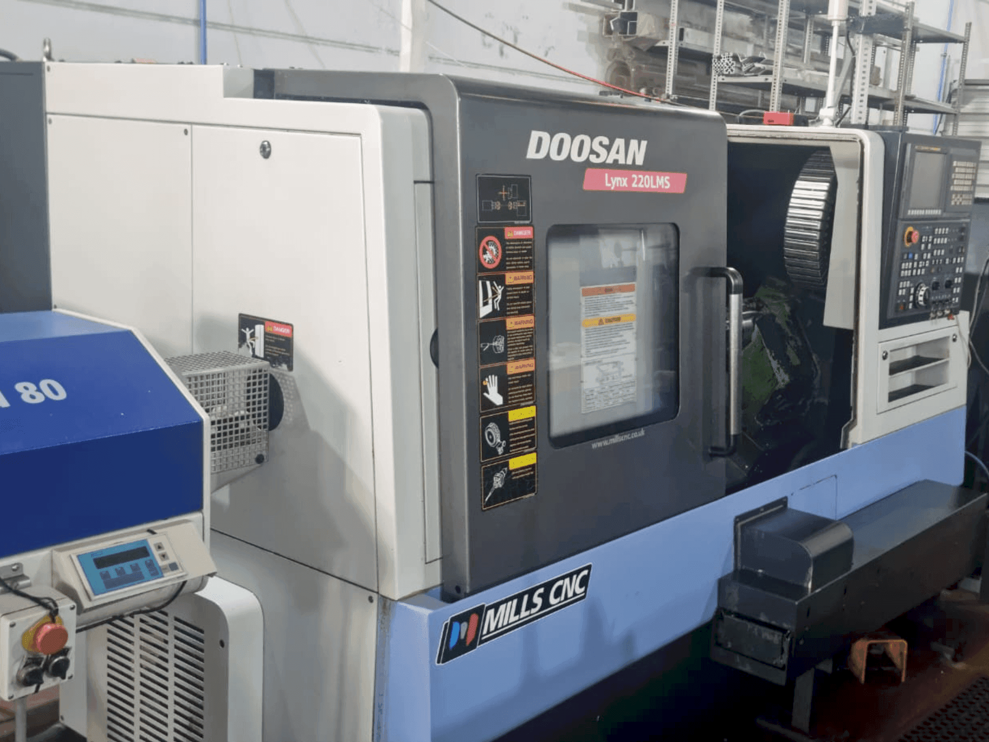 Front view of DOOSAN Lynx 220 LMSA machine