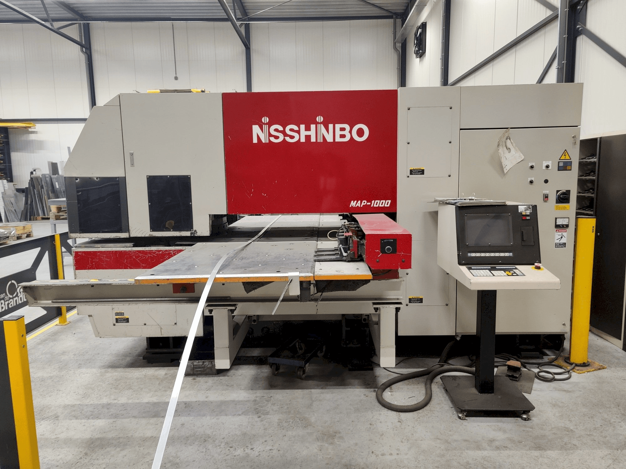 Front view of Nisshinbo MAP-1000 machine