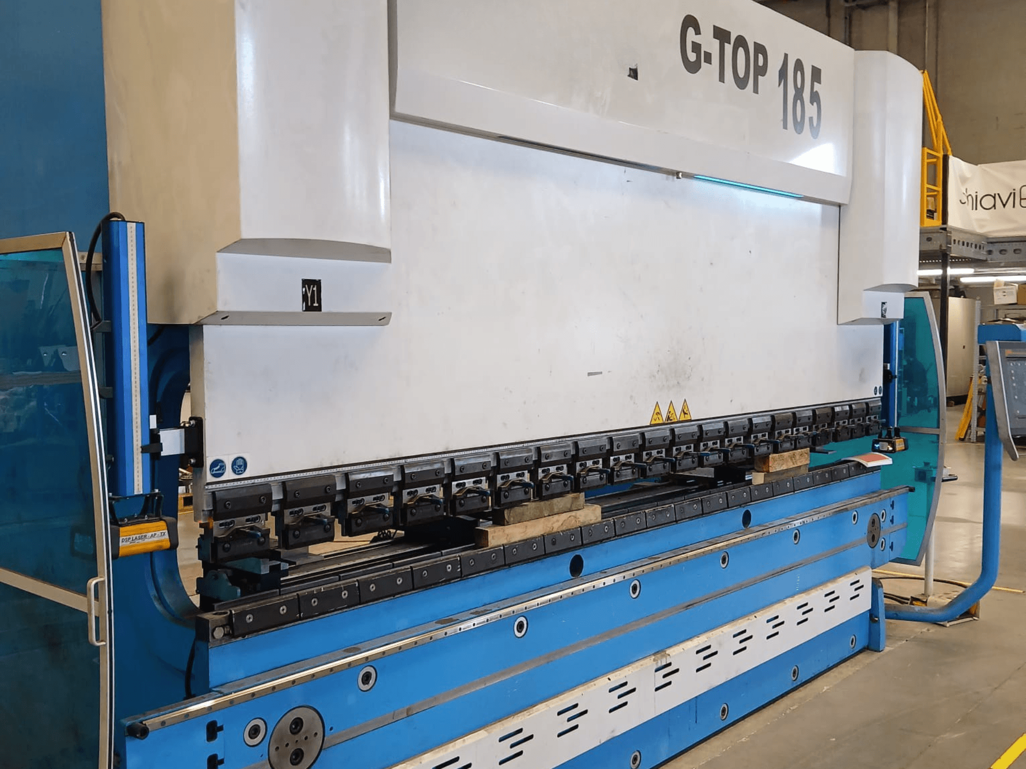 GASPARINI 4000×185 Press Brake in front view, showcasing bending tools and control panel on a blue and white machine.