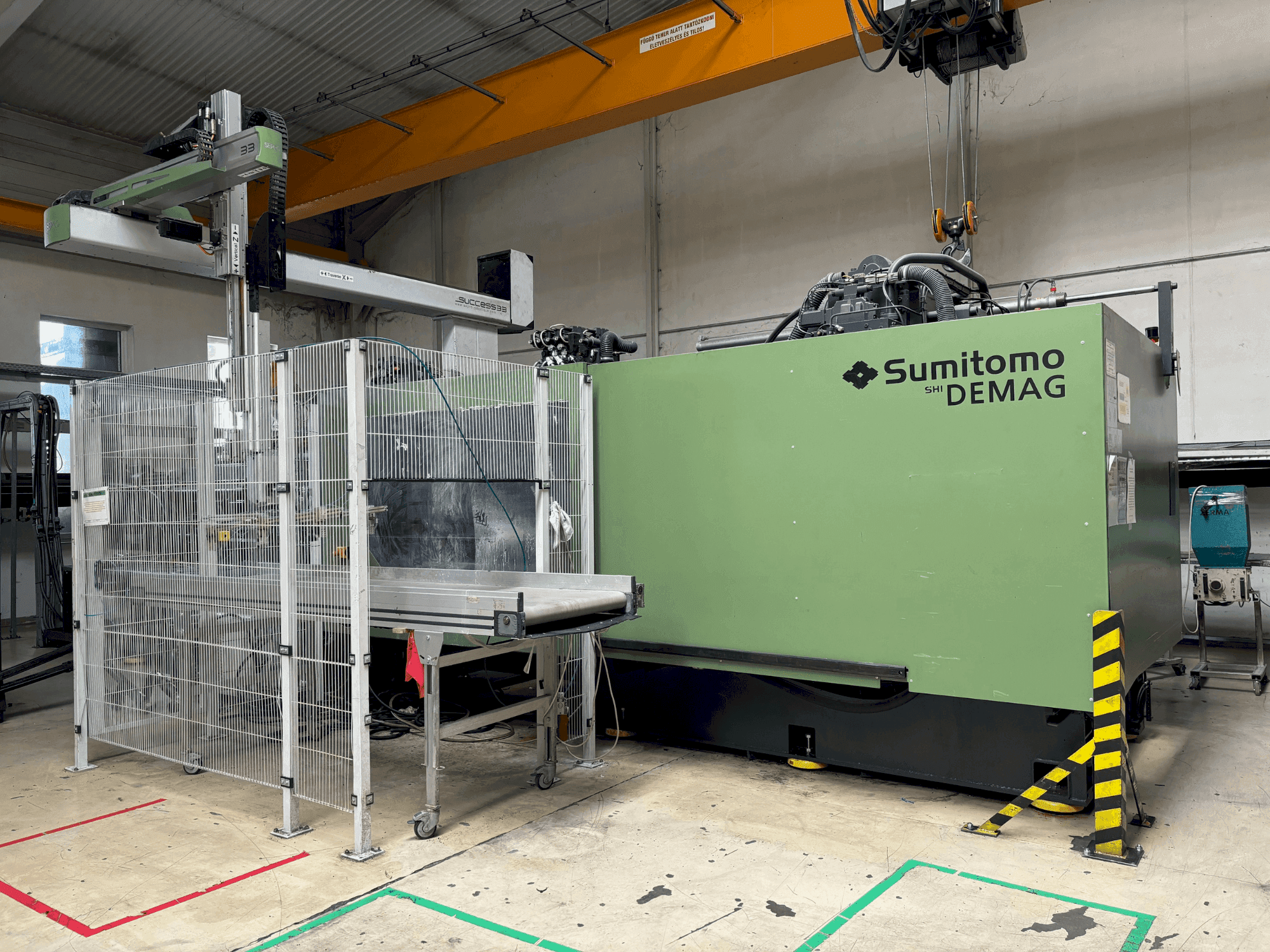 Front view of SUMITOMO SHI DEMAG Systec 800/1120-6400 machine