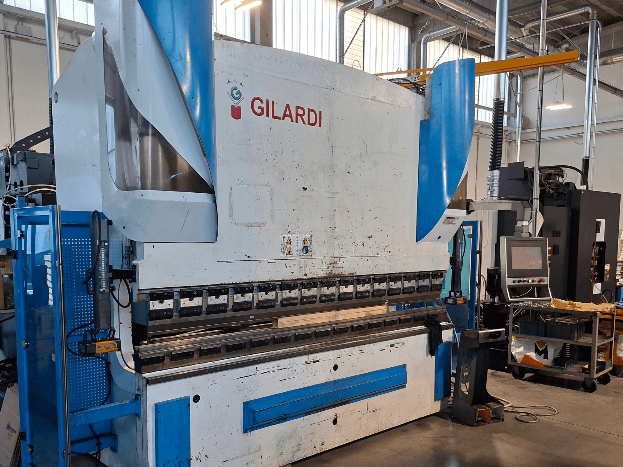 GILARDI Italy 3.25 hydraulic press, front view, showing operational controls and production environment details.
