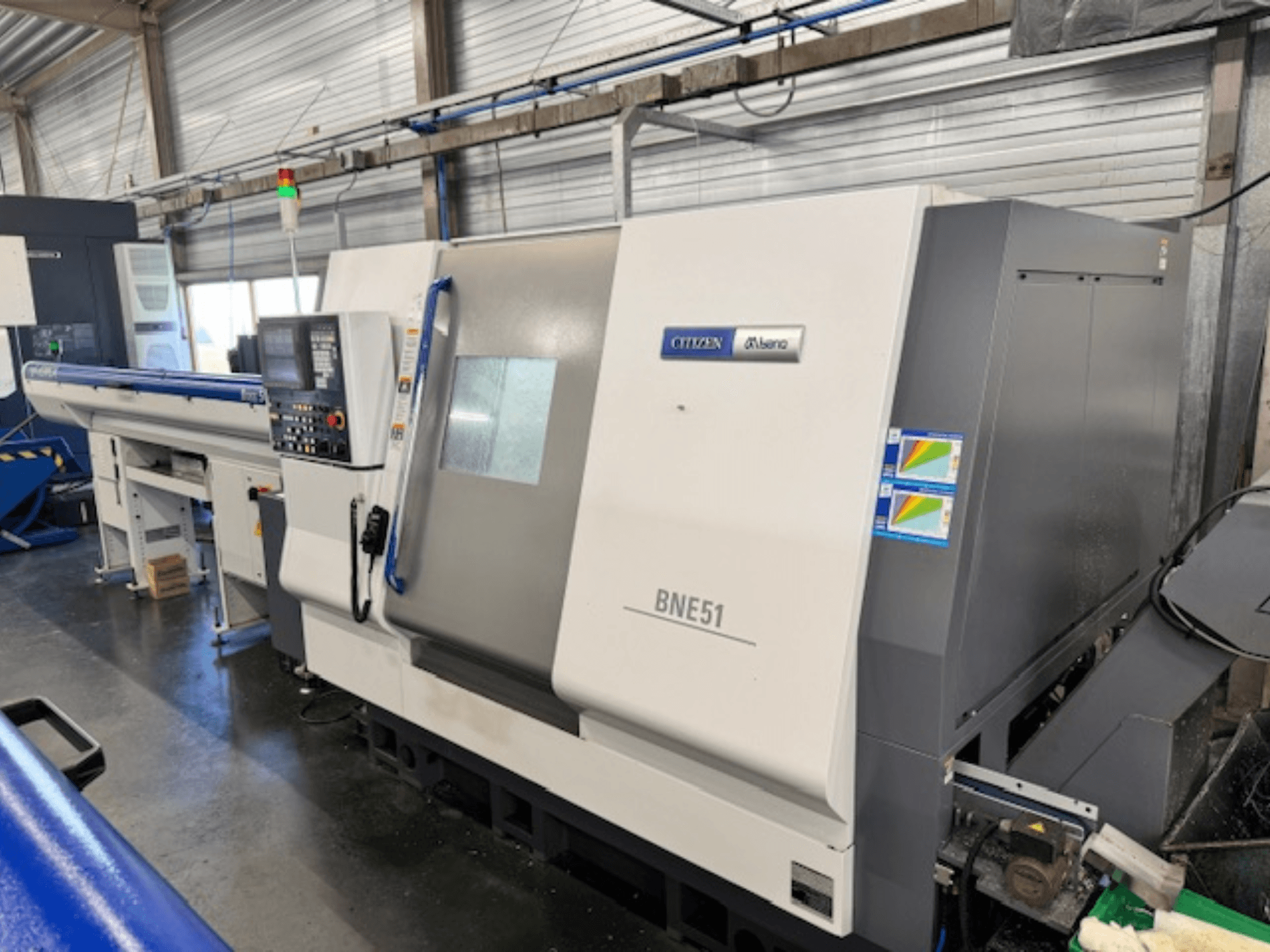 Citizen BNE-51MSY horizontal turning machine, side view showcasing control panel and feed mechanism.