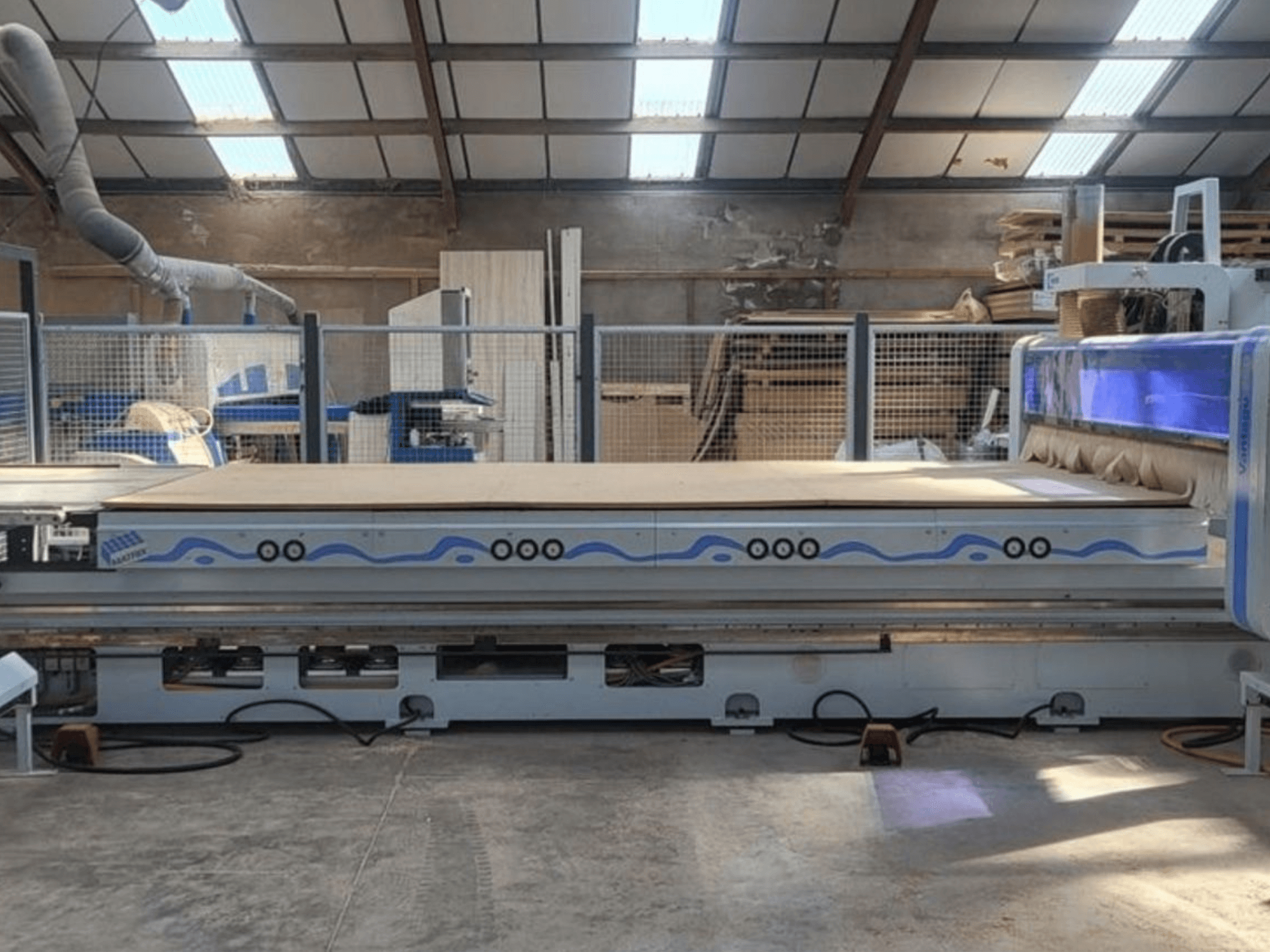 HOMAG WEEKE BHP200/VANTAGE714 CNC router shown from the front, featuring a spacious worktable in a workshop setting.