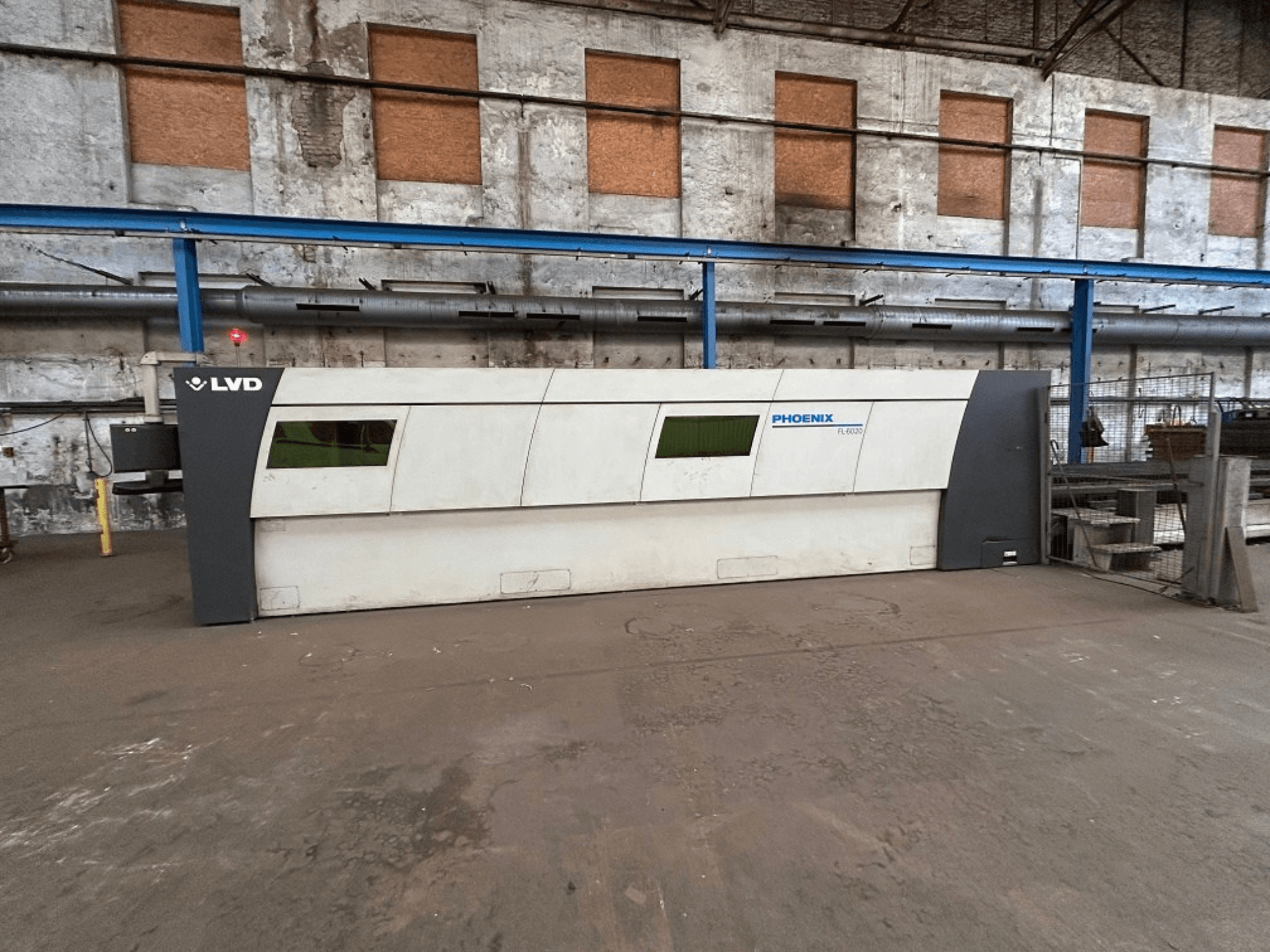 LVD Phoenix fiber laser cutting machine in an industrial setting, front view showcasing its sleek design and operational features.