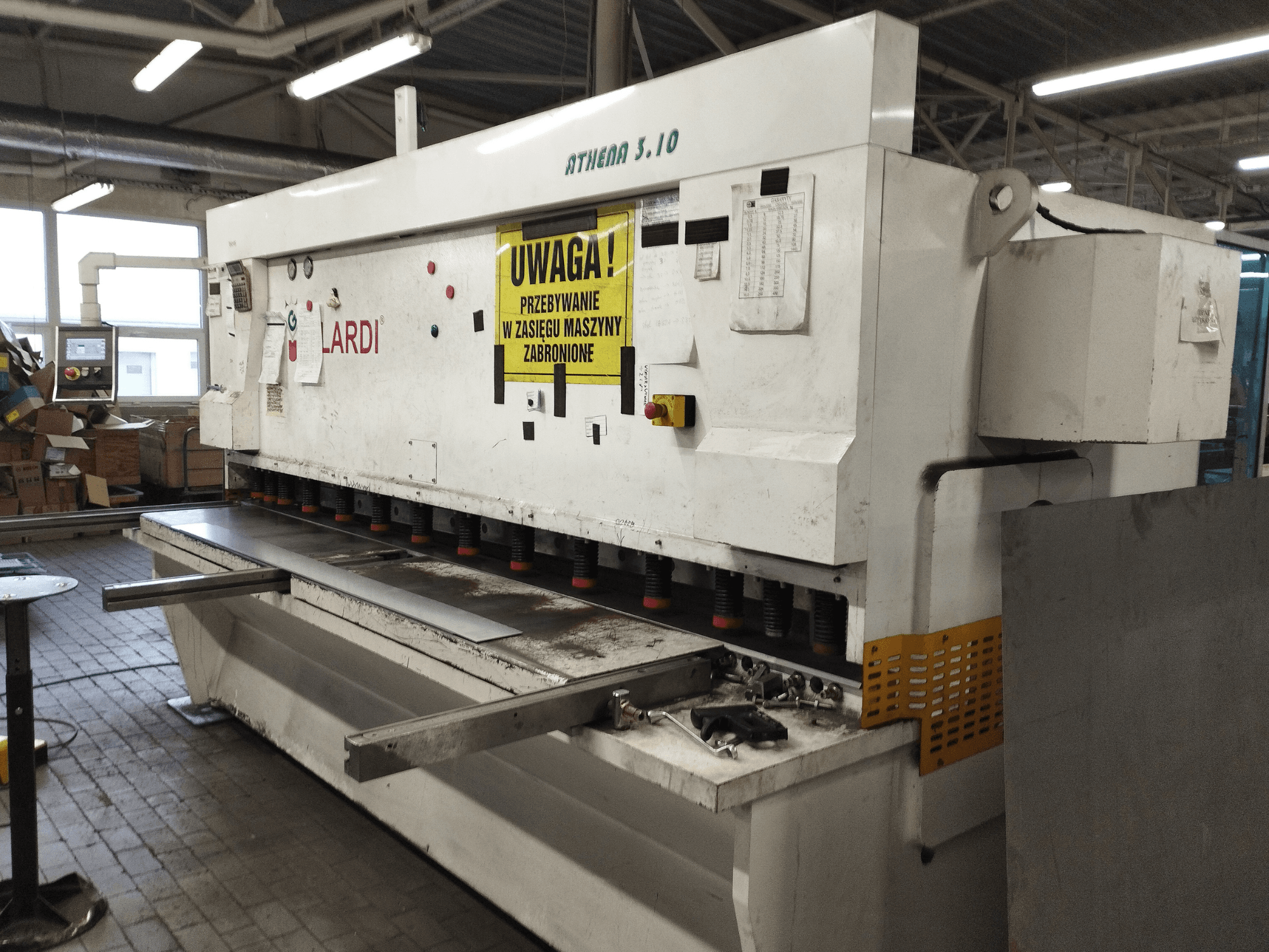 GILARDI ATHENA 3.10 CNC Shearing Machine in a workshop, front view, showing control panel and shearing blades.