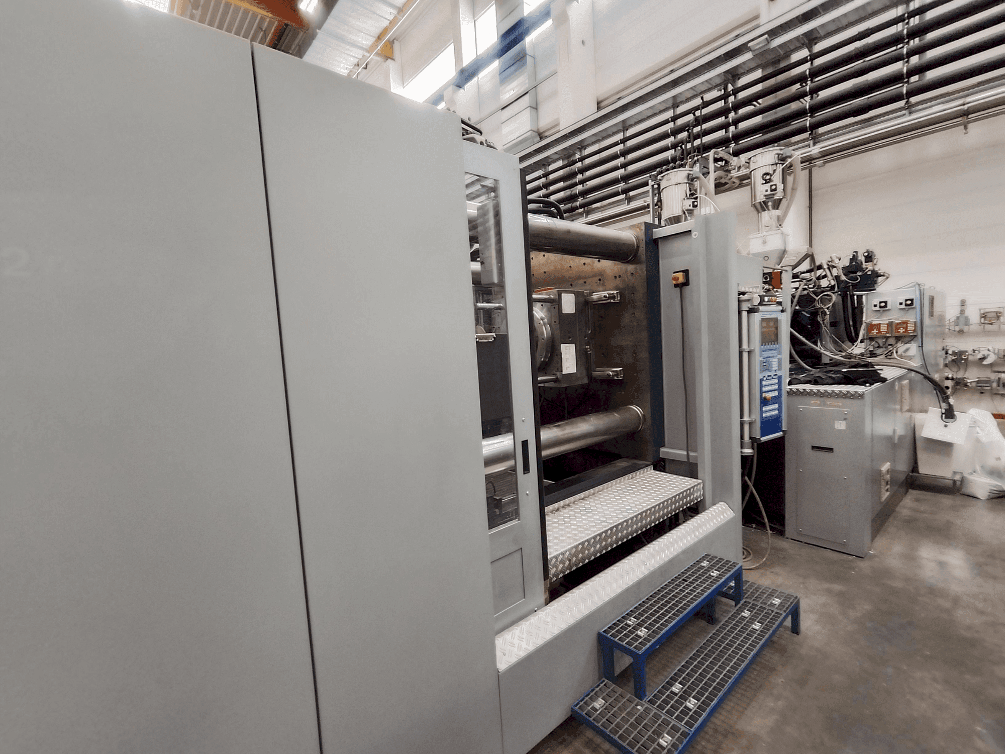 Front view of Battenfeld HM 8000/4500 + 4500 BMB 4 machine