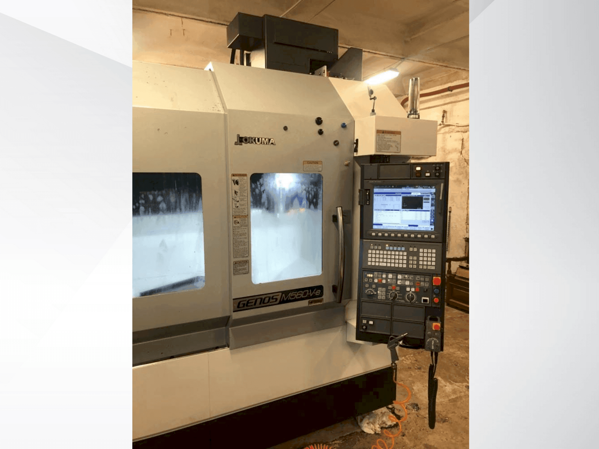 Front view of Okuma GENOS M560-V-e machine