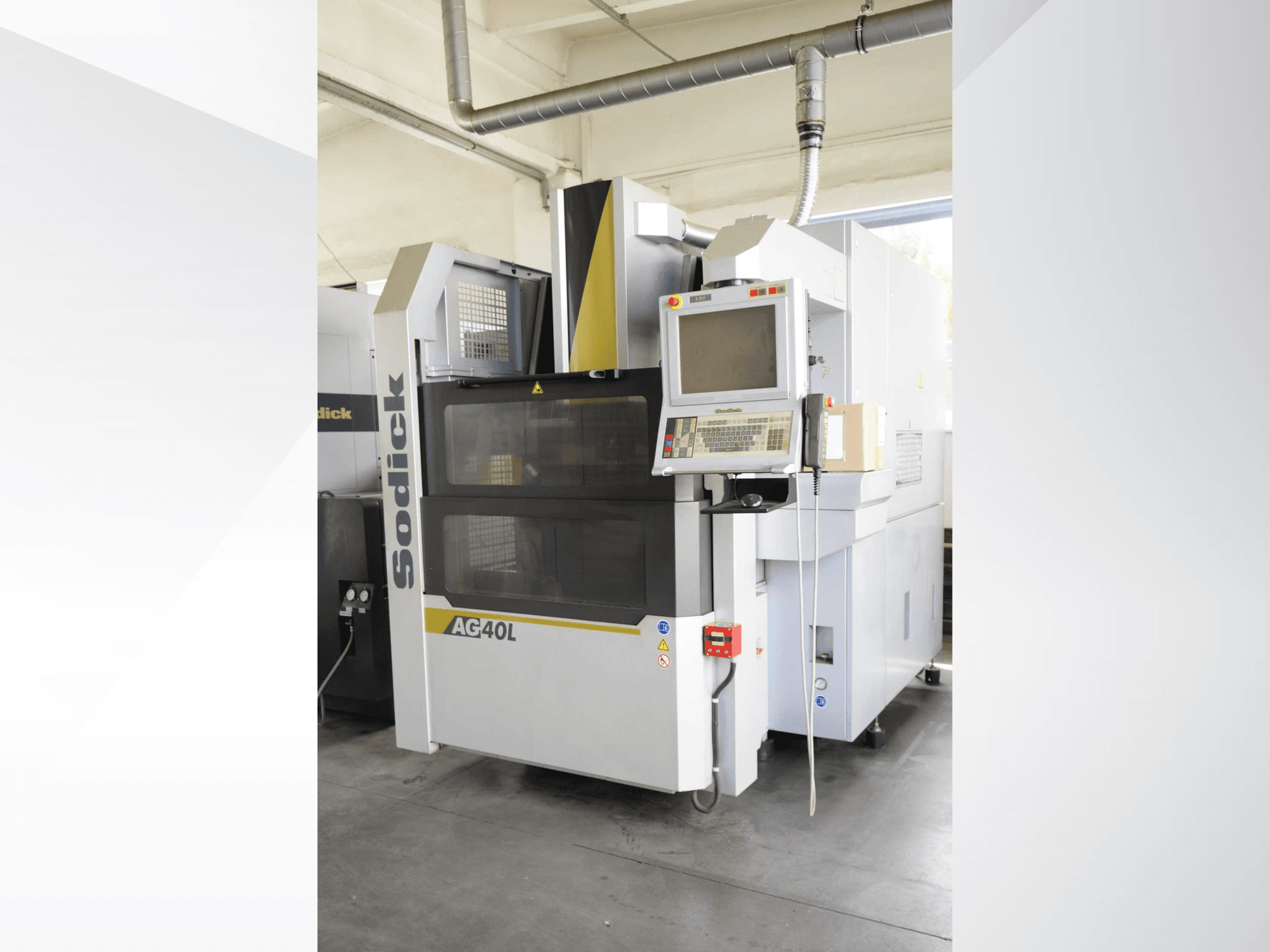 Sodick AG40L LN2 die-sinking EDM machine, front view with control panel displaying settings and safety features.