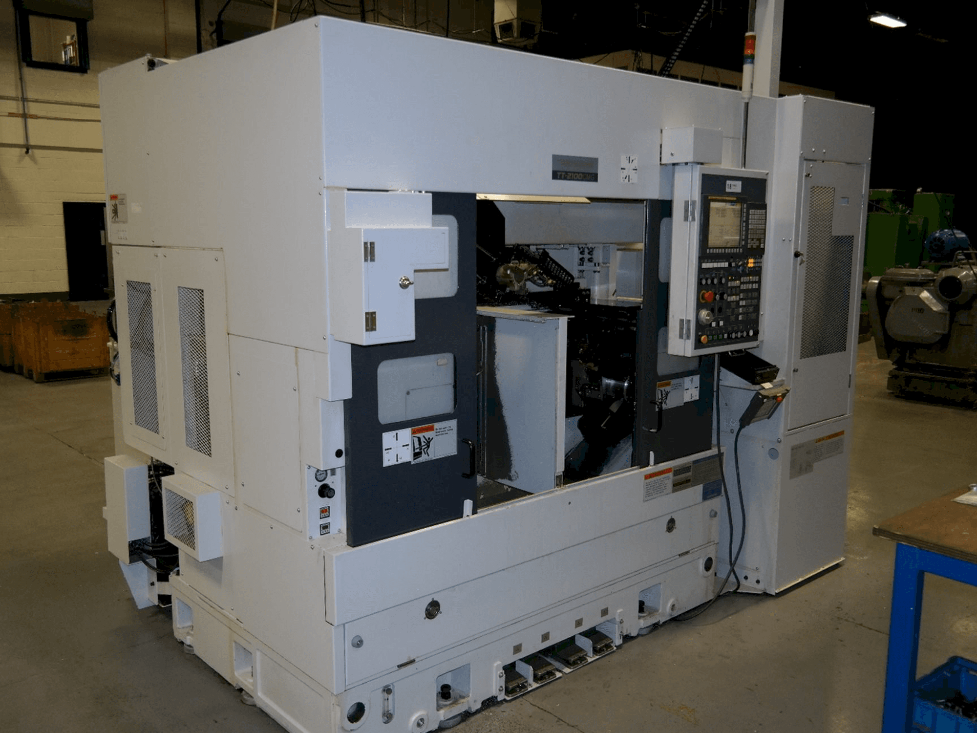 Front view of Takisawa TT2100CMGA machine